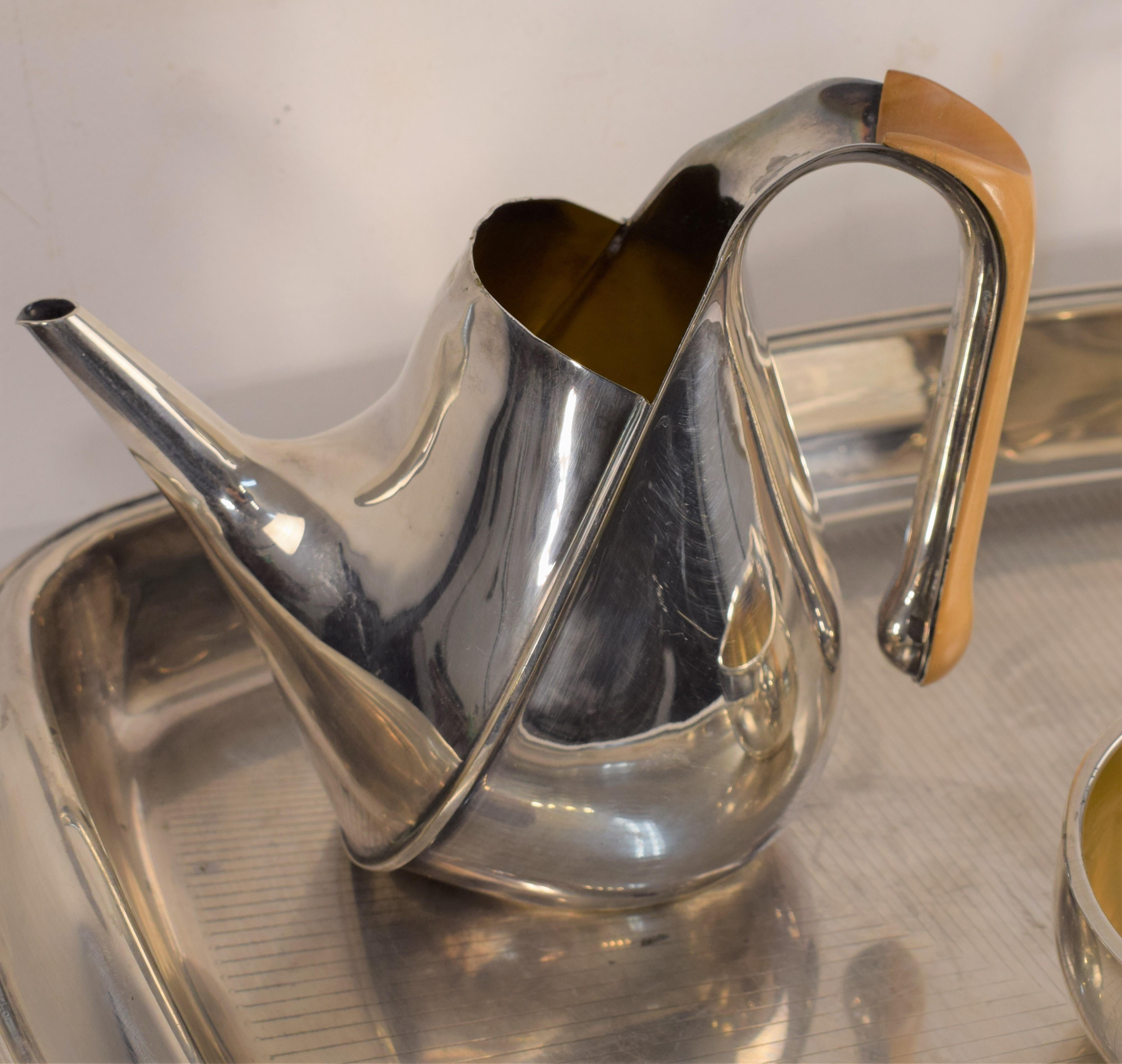 Brass Alessi Silver Wet Steel Tea Set Oronda “Oscar Tusquets”, 1983.