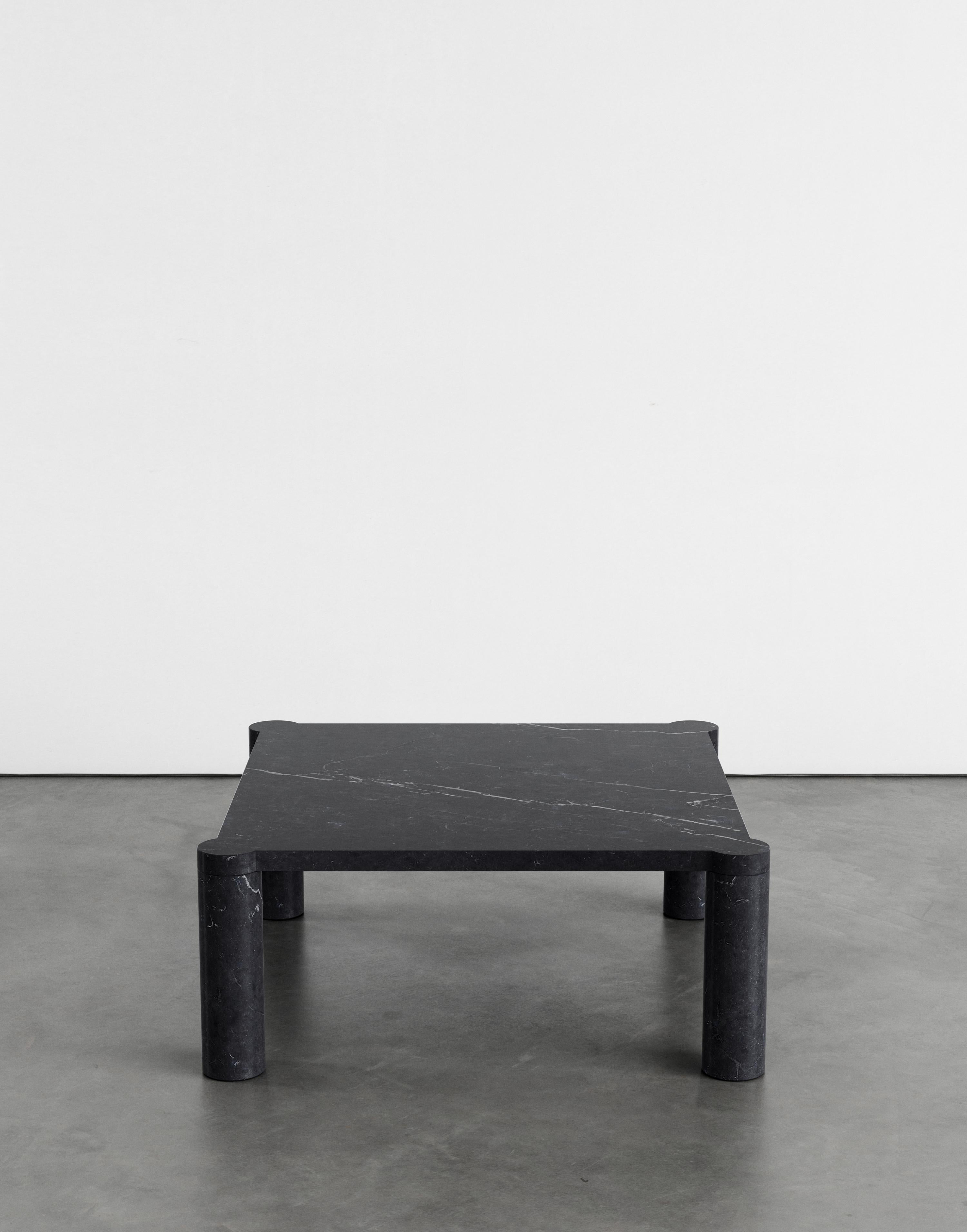 Alessio 80 coffee table by Agglomerati
Dimensions: D 80 x W 80 x H 33 cm.
Materials: Nero Marquina marble.
Available in other stones. 

Alessio is a square coffee table enclosed by four cylindrical legs which sit seamlessly flush under the