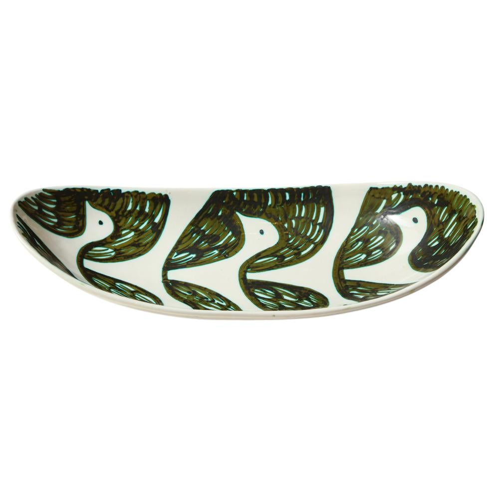 Alessio Tasca for Raymor Bowl, Ceramic, Green and White, Birds, Signed. Large oval bowl or serving tray. Impressed mark on underside which reads: Tasca Raymor Italia 1476. Minute chip on underside elevated edge to the left of where the ceramic is