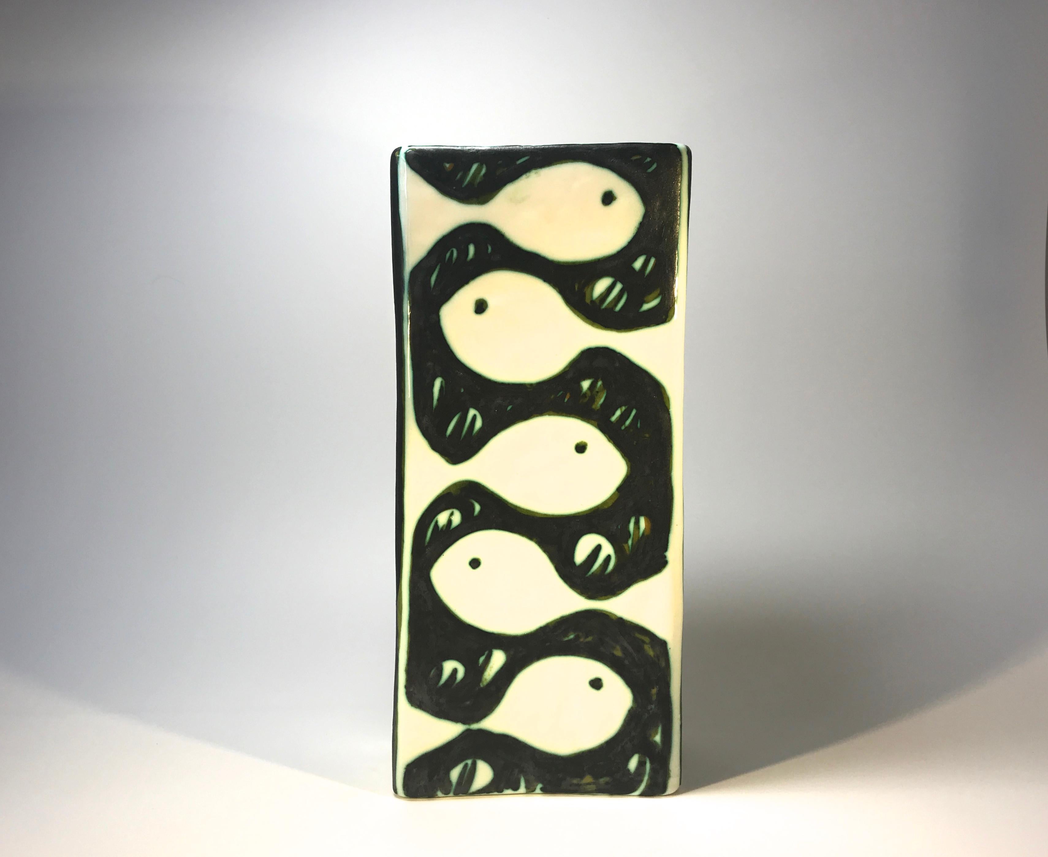Alessio Tasca green and white tall oblong vase with fish design front and back. Five fish one side and four on the reverse,
circa 1960s
Signed 1456-B Tasca Nove on base
Good condition, hairline crack and crazing inside with minor crazing on same