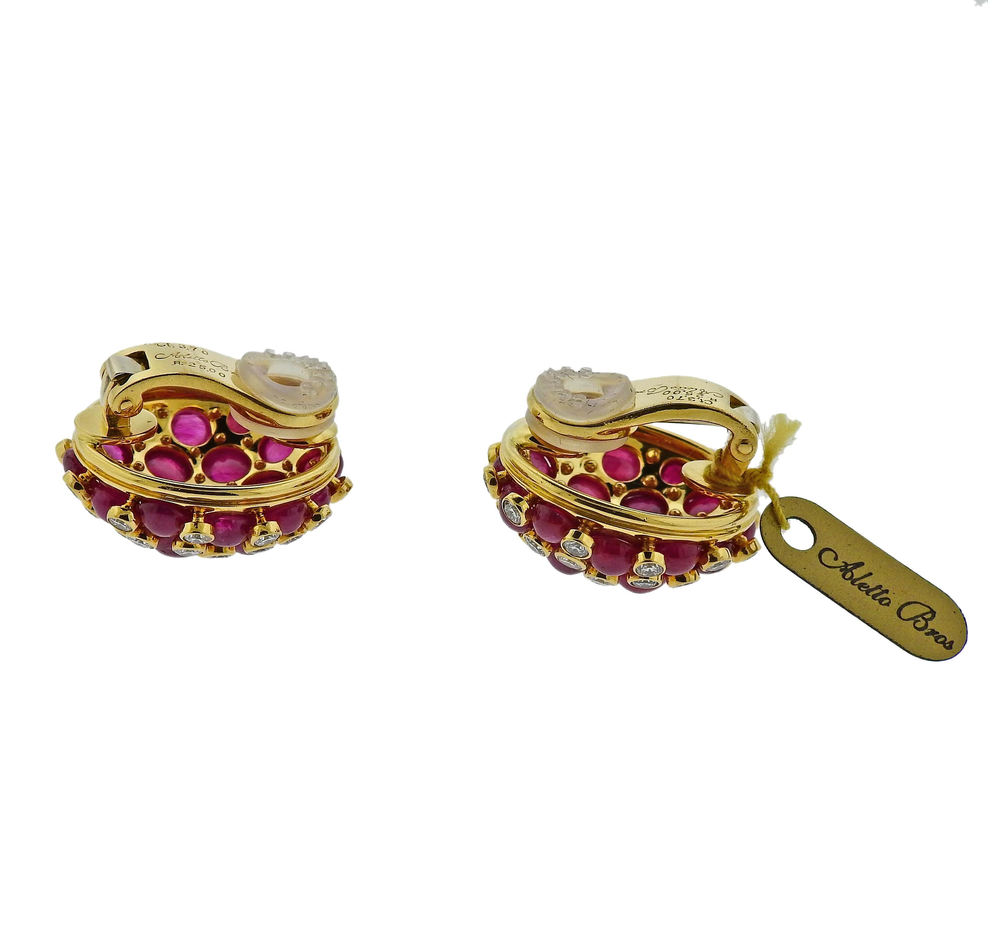 Pair of new 18k yellow gold earrings by Aletto Brothers, featuring 25 carats in ruby cabochons, and 3.70ctw in VVS/VS-G diamonds.  Earrings are 24mm in diameter. Weigh 28.9 grams. Marked: USA,750, Ct.3.70,R25.00, Aletto Bros.