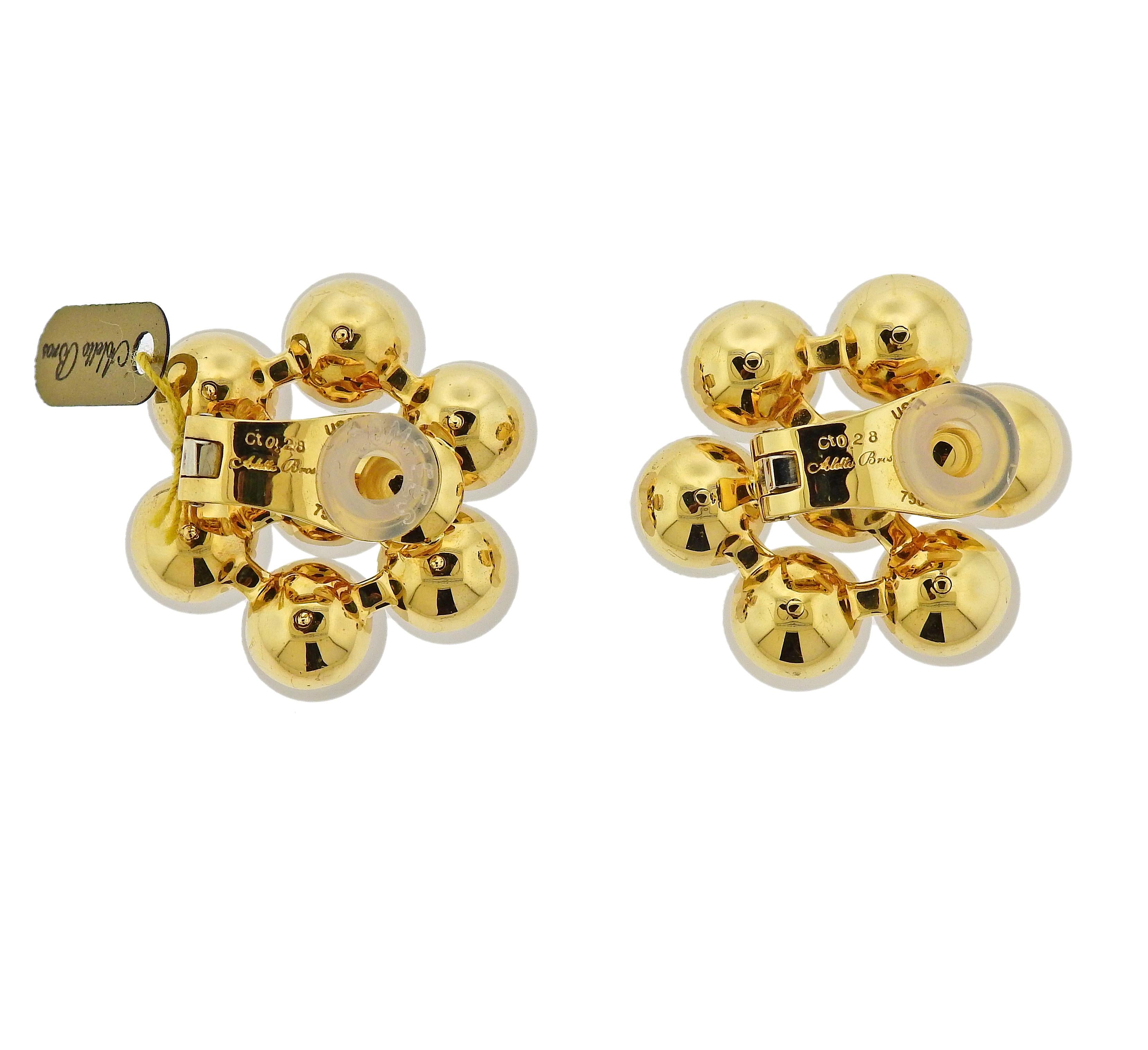 Pair of new 18k yellow gold earrings by Aletto Brothers, featuring frosted crystal balls, each set with a diamond in the center. Total weight 0.28ctw VVS-VS/G. Earrings are 31mm x 31mm. Weigh 45.7 grams. Marked: USA,750, Ct. 0.28, Aletto Bros.