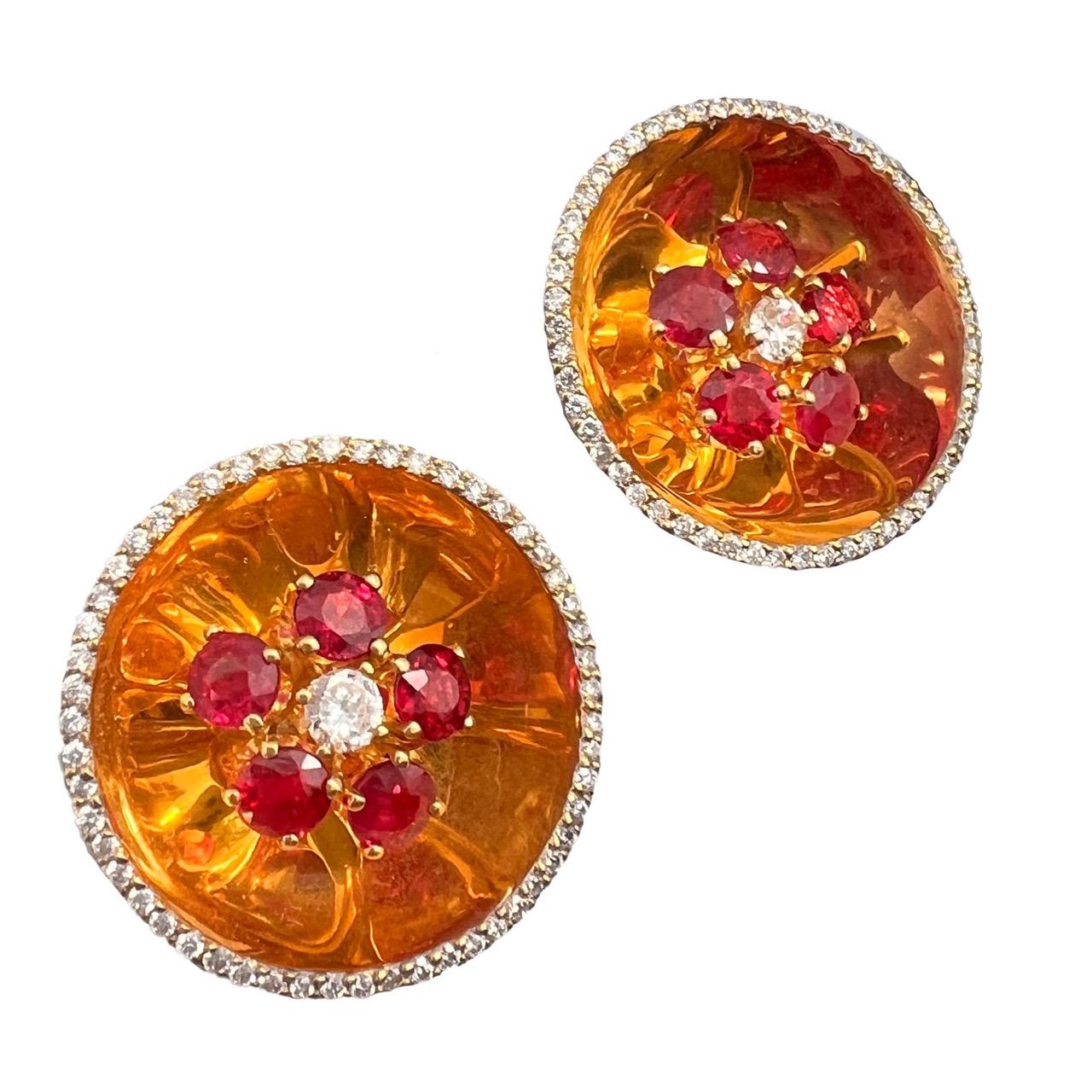Aletto Brothers 18K yellow gold ruby and diamond lever back stud earrings.  Featuring 3.00 carats of vibrant rubies and 1.00 carat of dazzling diamonds, this stunning pair weighs 27.9g and spans 7/8 inch wide, creating a bold yet elegant