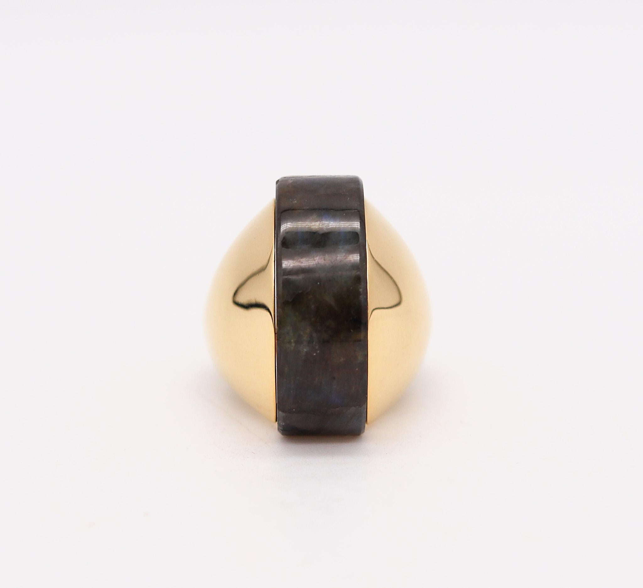 Geometric ring designed by the Aletto Brothers.

A contemporary geometric cocktail ring, created by the Italo-American jewelry designers Aletto Brothers. This cocktail ring has been masterfully crafted in a bombe shape in solid yellow gold of 18