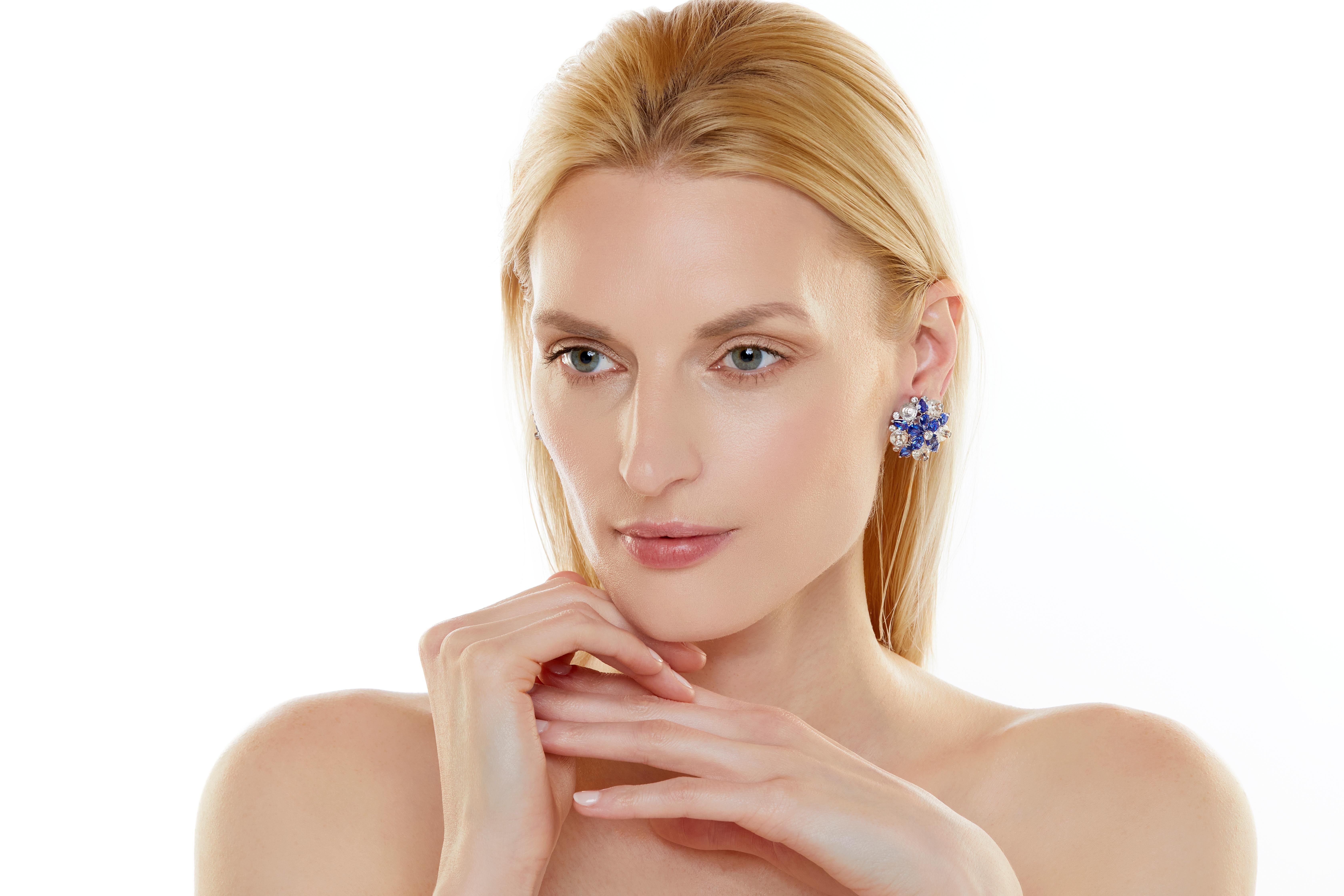 The Aletto family has been making exquisite hand-crafted jewelry for five generations. The firm was founded in Naples, Italy in the late 19th century and is currently based in Boca Raton. Designed as stylized flowers, these ear clips feature bright