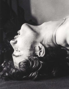 Tom (Arching on the bed)