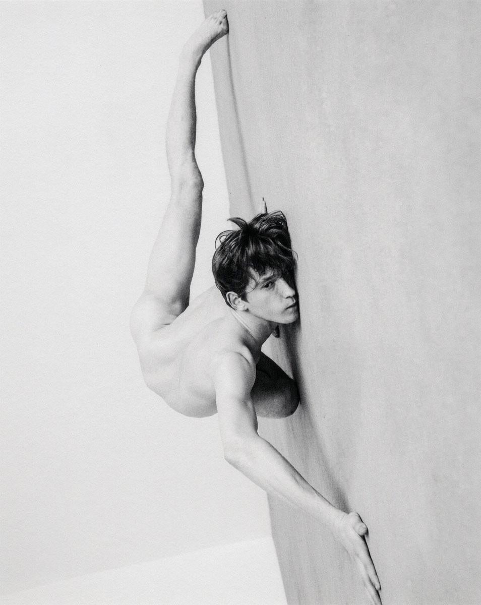 Alex Avgud Nude Photograph - Vladimir K. (Young Male Nude in flexible, sensual position on floor)