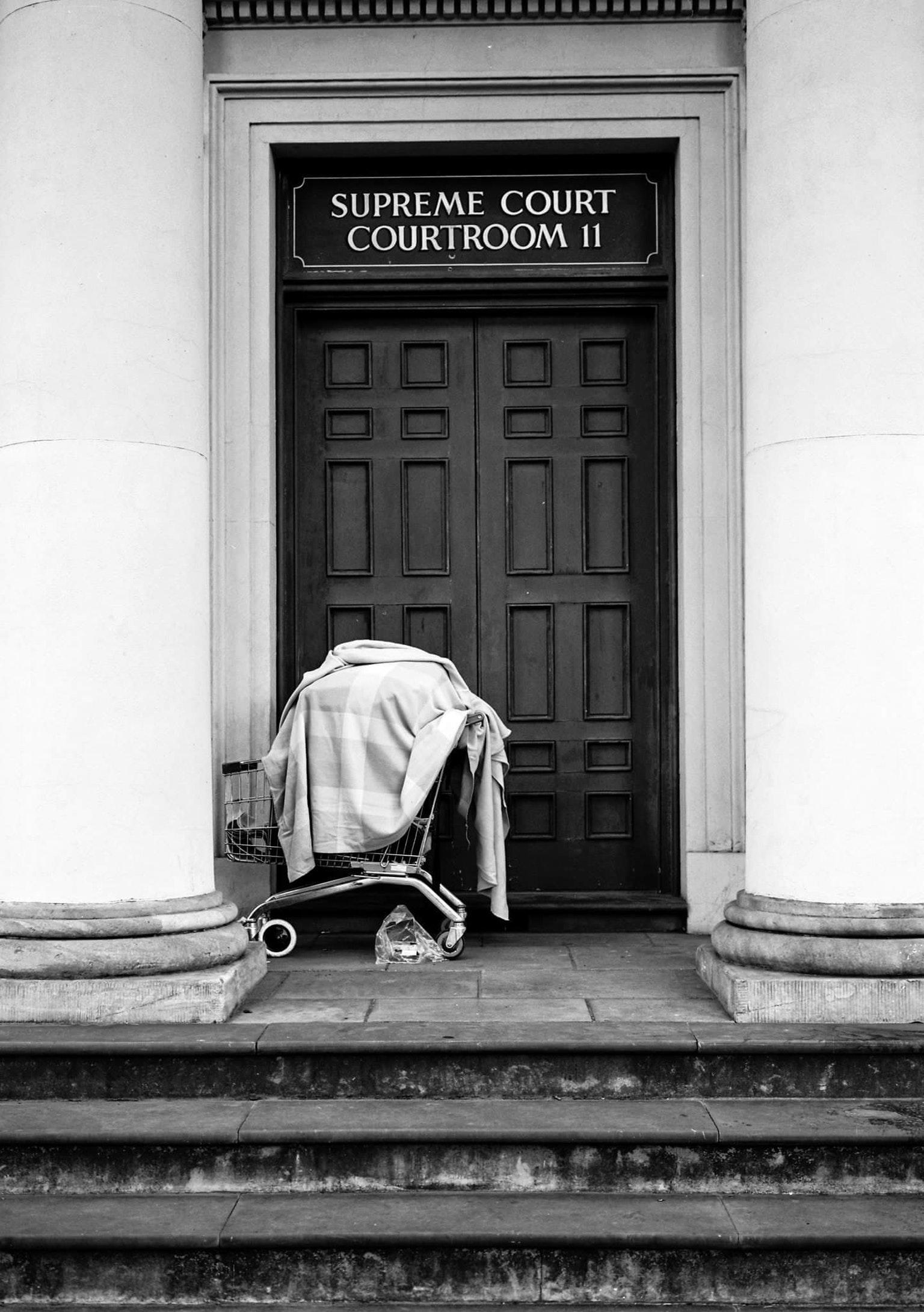 Unframed limited edition fine art print. Edition 1 of 10. 

Justice is a medium format monochromatic image shot for the OVERSEERS OF STREETS series,  which also coincided with the Anti Poverty Network's campaign in South Australia.

ALEX FRAYNE is a