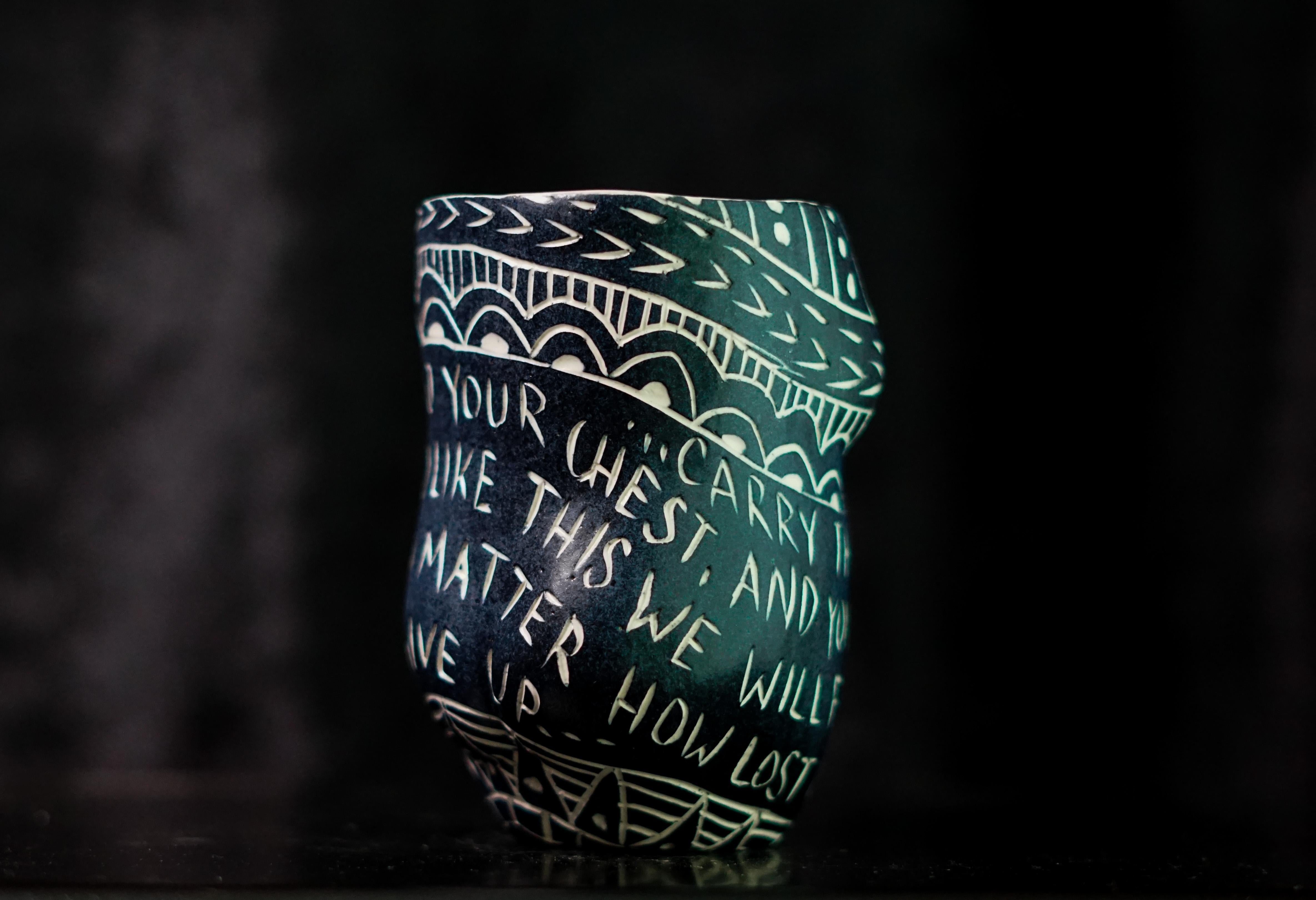 “Carry the Song..” Porcelain cup with sgraffito detailing by the artist - Sculpture by Alex Hodge