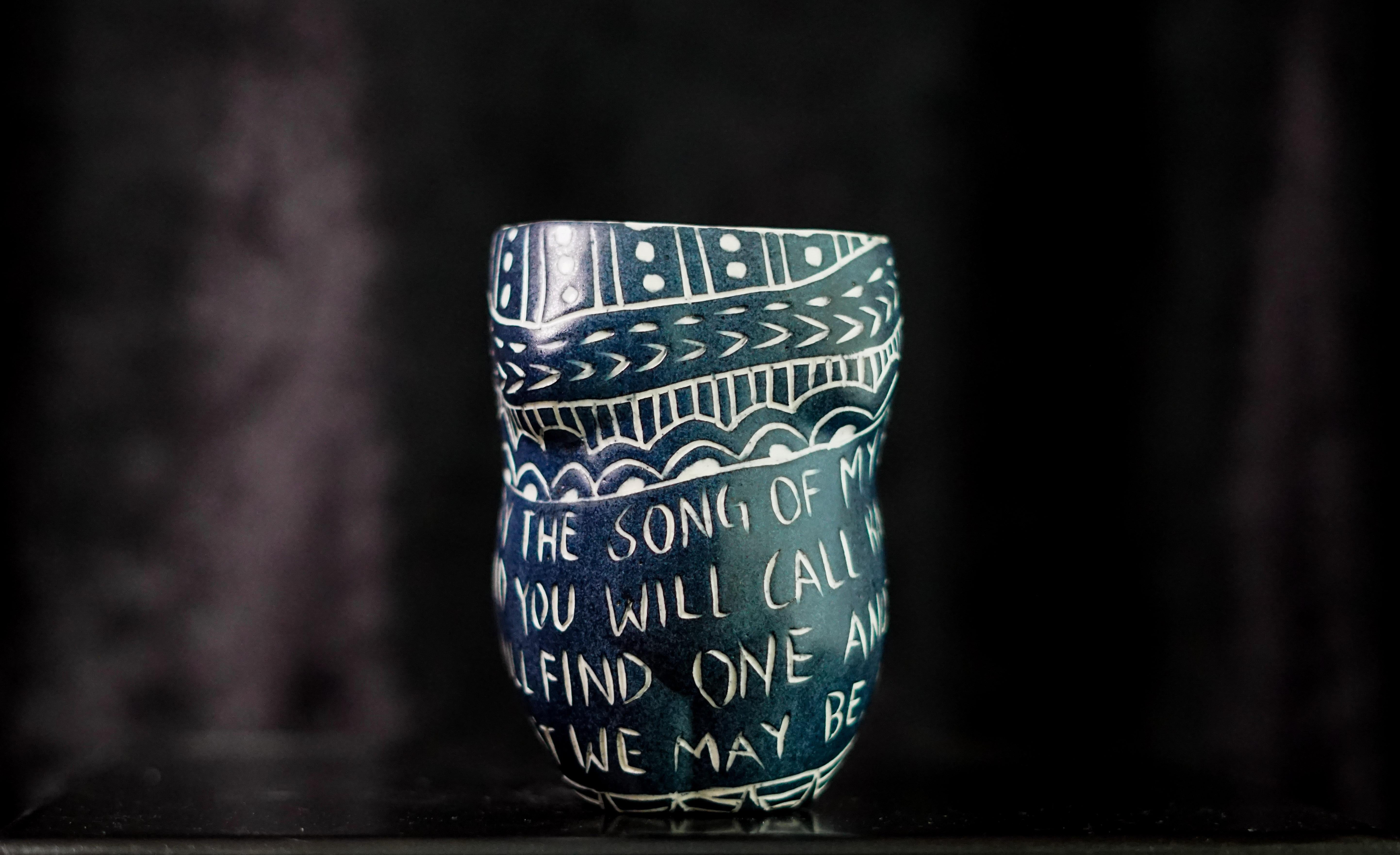 “Carry the Song..”, 2019
From the series Fragments of Our Love Story
Porcelain cup with sgraffito detailing
5 x 3 x 3 inches.

“Carry the song..” Carry the song of my breath to your chest. And you will call me back. And like this we will find one