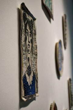 Supporting Perspective and Curled Girl Portrait. Porcelain Wall sculpture