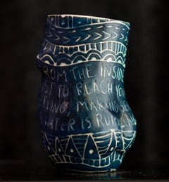 “...Is Beating Me From the Inside...” Porcelain cup with sgraffito detailing