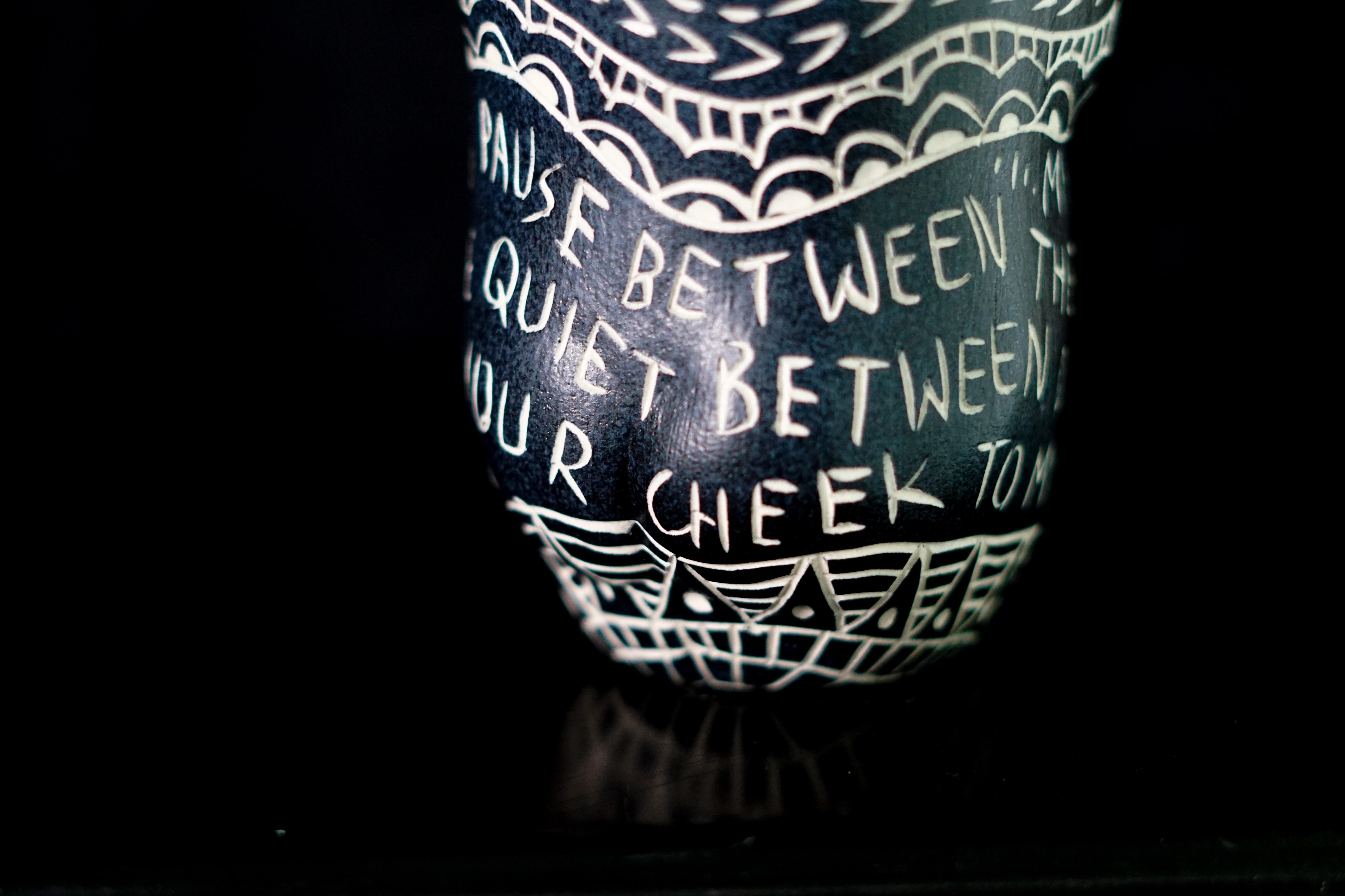 My favorite moment, 2019 by Alex Hodge
From the series Fragments of Our Love Story
Porcelain cup with sgraffito detailing
4.5 in. x 3 in. W x 3 in.

This cup is one of 48 that make up the installation, “Fragments of Our Love Story.” These cups