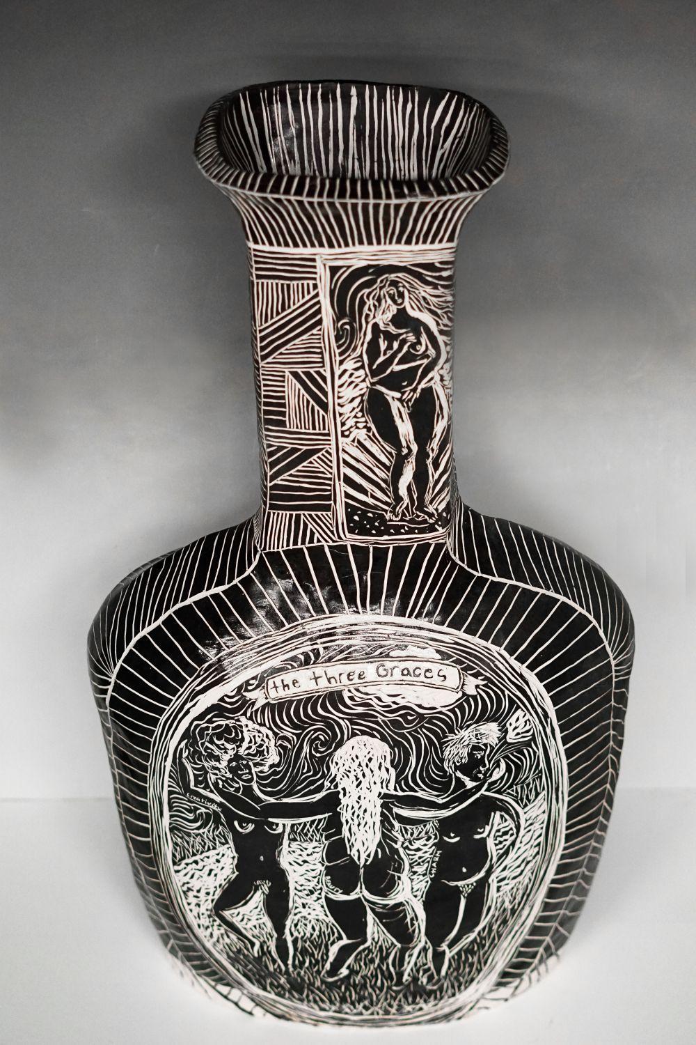 Reimagining the Divine as You
2014
Hand built and carved porcelain vase
One of a kind

This vessel is a part of the series Unsung Muses and references art historical imagery such as Botticelli’s Venus, the Minoan Snake Goddess, Hera, and the Three