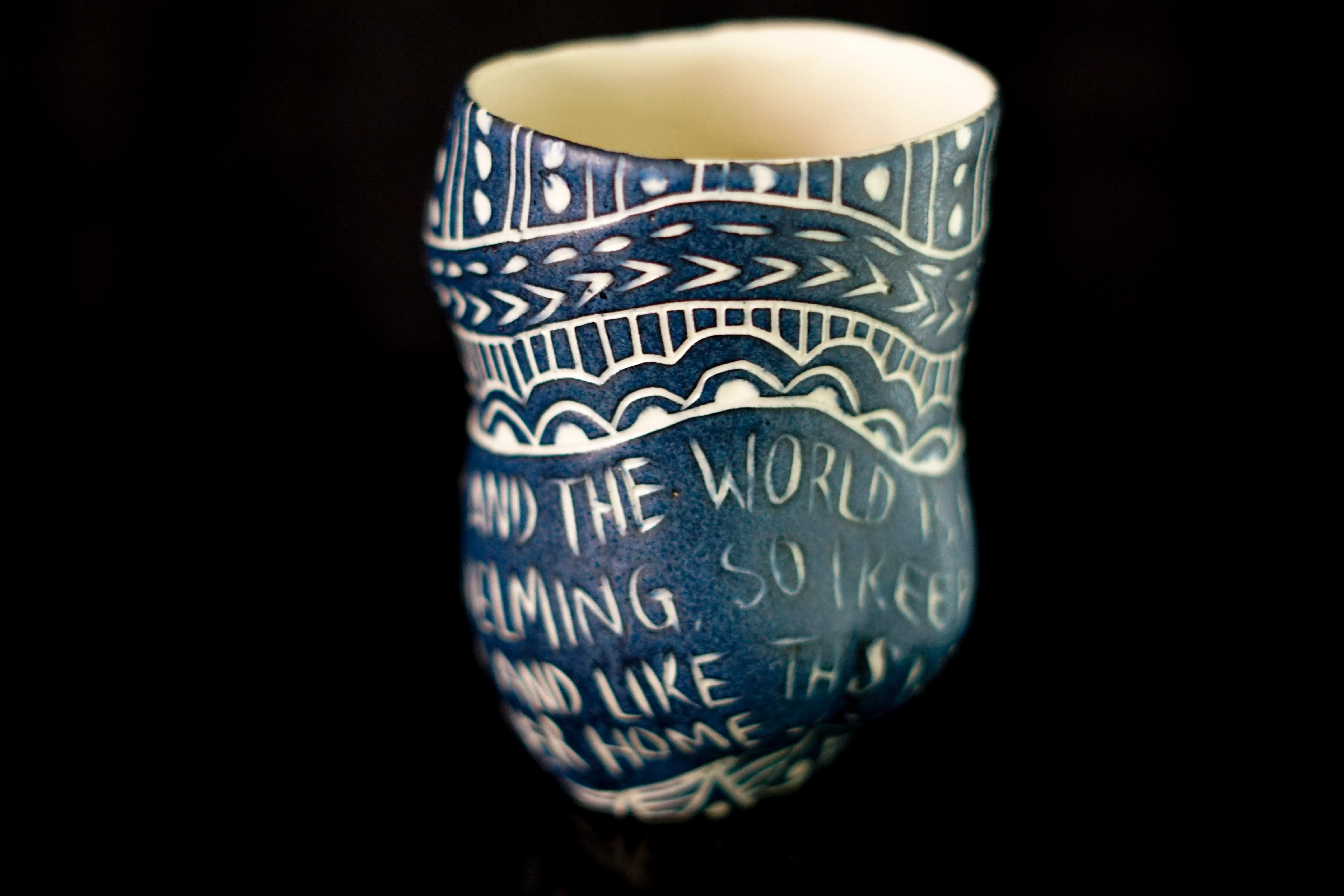Set of 3 Handmade Porcelain Cups with Sgraffito Detailingby Alex Hodge
From the series Fragments of Our Love Story
Porcelain cup with sgraffito detailing
Overall size: 4.5 x 9 x 3 inches
Individual size: 4.5 x 3 x 3 inches

1. “When the door
