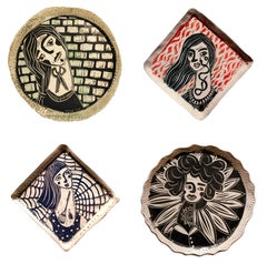 Ensemble de 4 sculptures murales en porcelaine