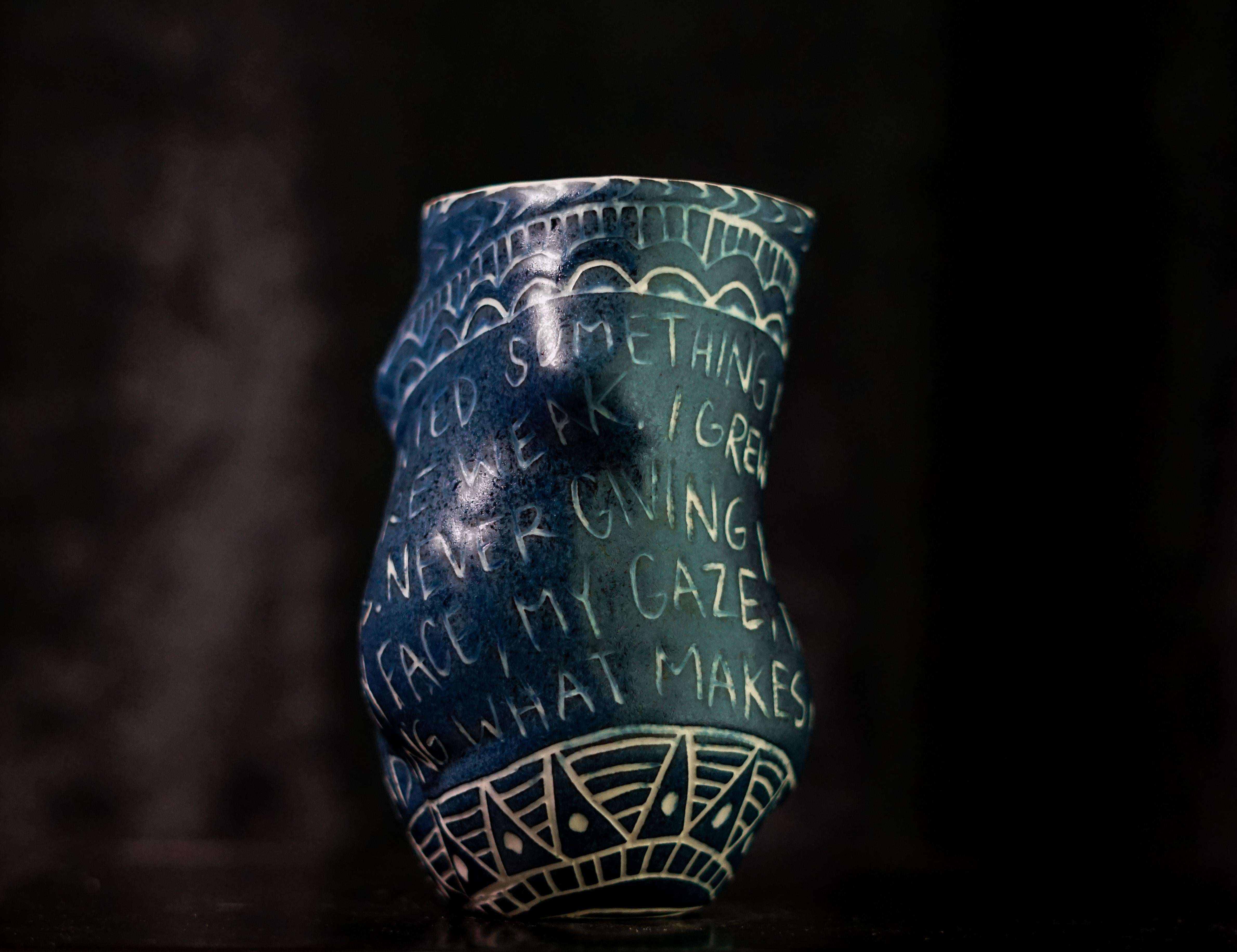 “You Wanted Something...”, 2019
From the series Fragments of Our Love Story
Porcelain cup with sgraffito detailing
5.5 x 3 x 3 inches.

“You wanted something..” You wanted something perfect. Delicately pure. Weak. I grew against your darkness. Never
