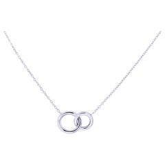 Alex Jona, collier à pendentif cercles imbriqués en or blanc 18 carats