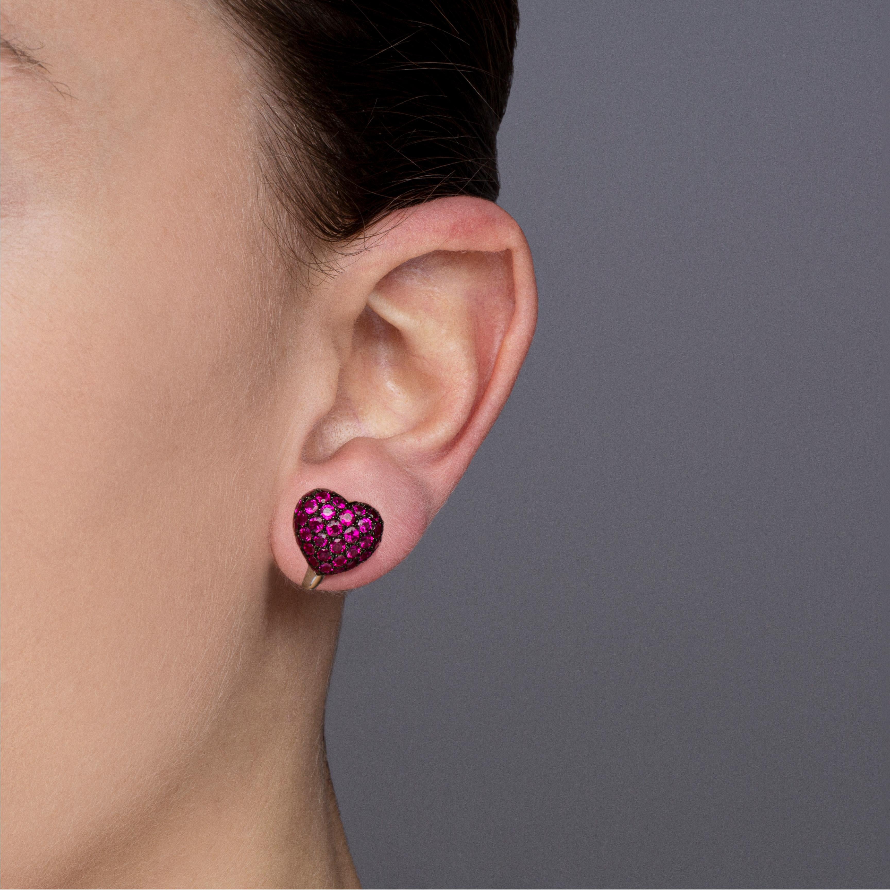 Alex Jona design collection, hand crafted in Italy, 18 karat white gold, bombé heart  clip-on earrings, set with 3.53 carats of Burmese Rubies, with dark rhodium setting.  
Dimensions : H 0.55 in x W 0.50 in x D 0.27 in - H 13.97 mm x W 12.7 mm X D