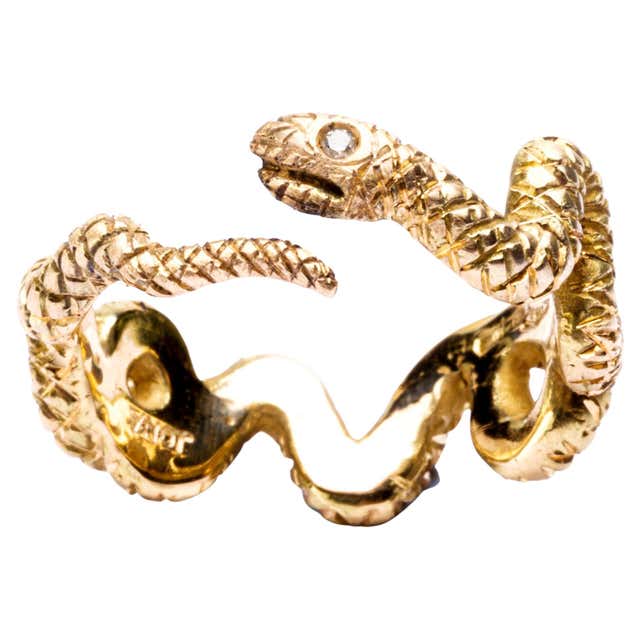 18 Karat Gold Coiled Snake Ring with Emerald and Sapphires at 1stDibs