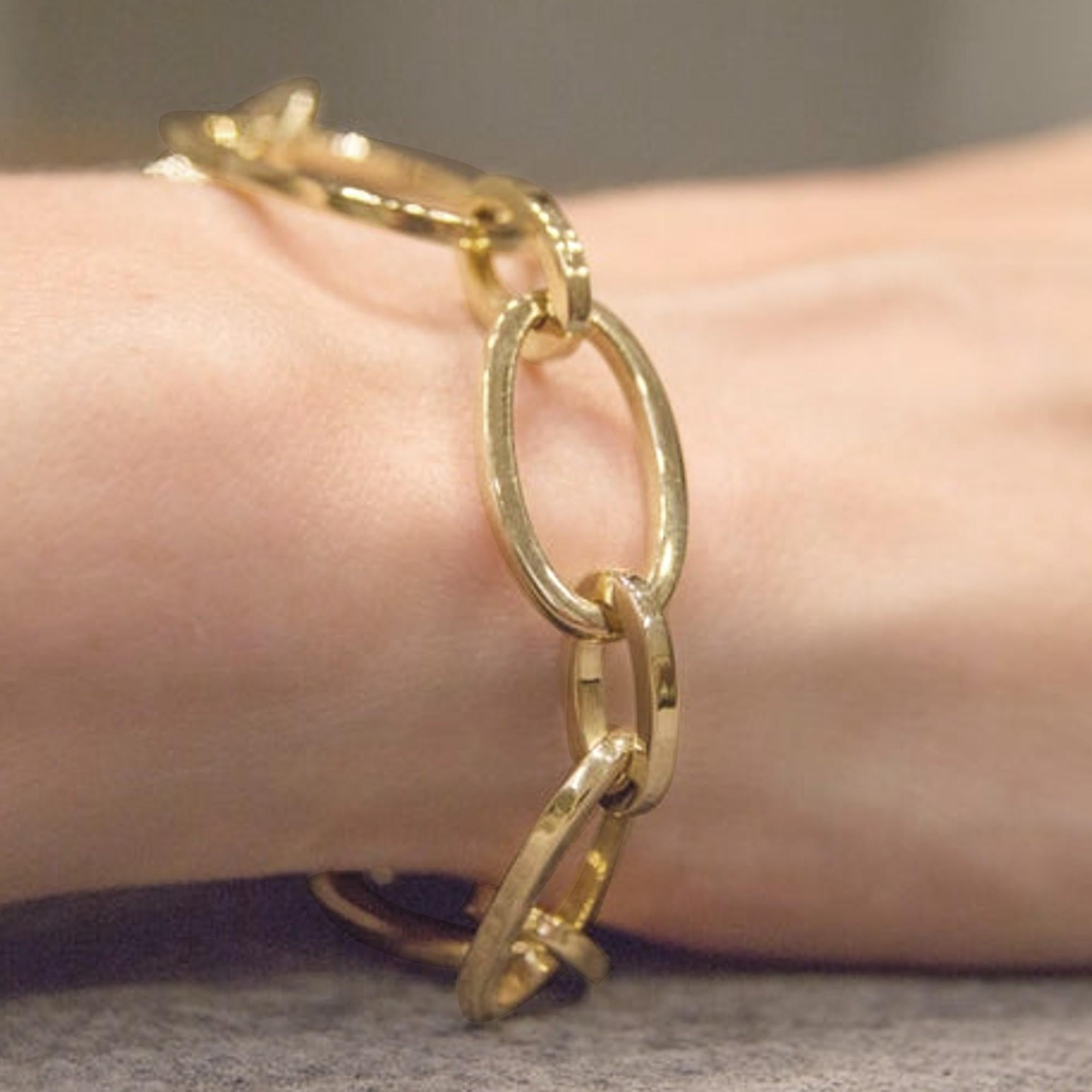 Collection Jona, fait à la main en Italie, or jaune 18 carats, bracelet à chaîne de 7,9 pouces-20 cm de long.

Les bijoux Alex Jona se distinguent, non seulement par leur design particulier et par l'excellente qualité des pierres précieuses, mais