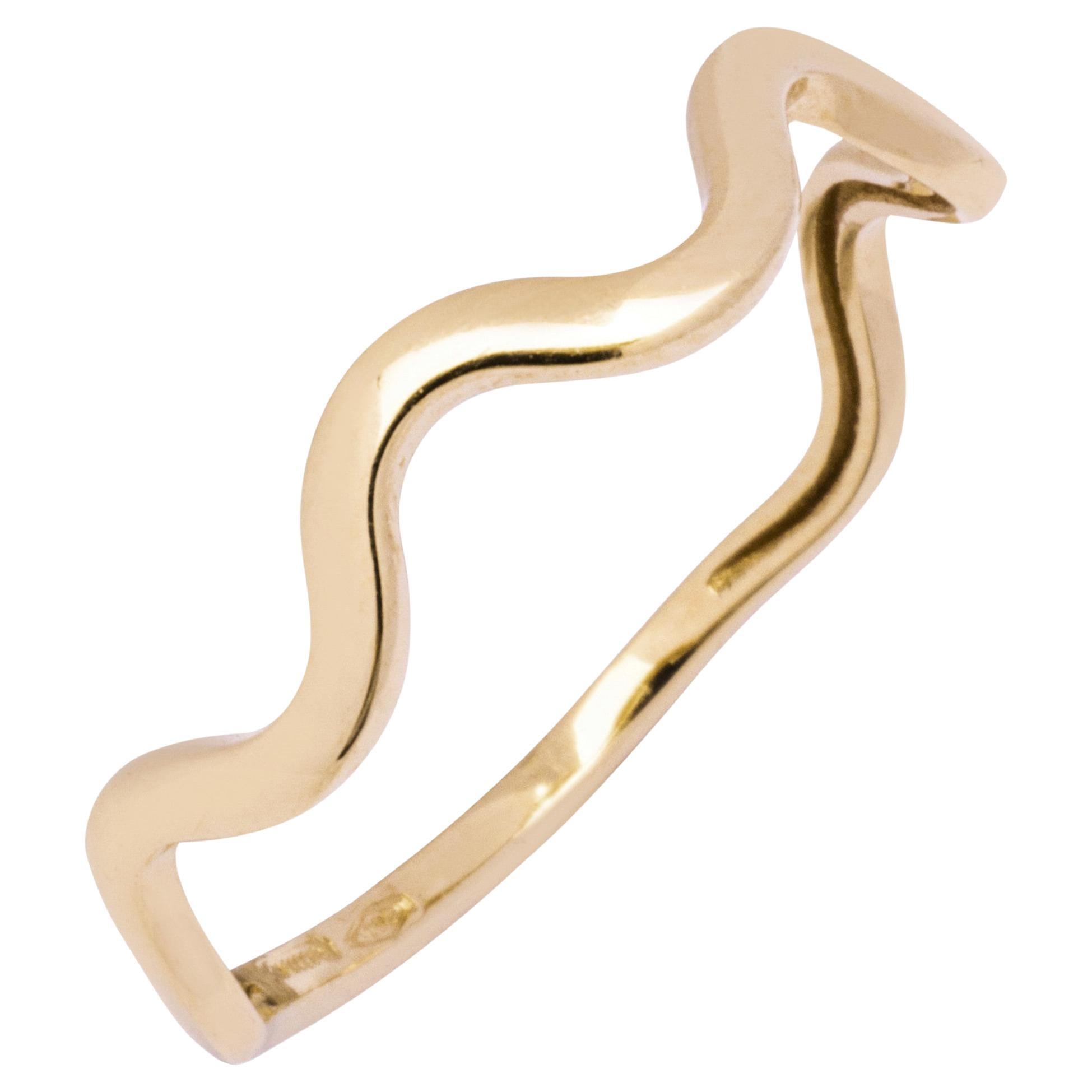 Alex Jona design collection, hand crafted in Italy, 18 Karat yellow gold thin wave ring. 

Alex Jona jewels stand out, not only for their special design and for the excellent quality of the gemstones, but also for the careful attention given to