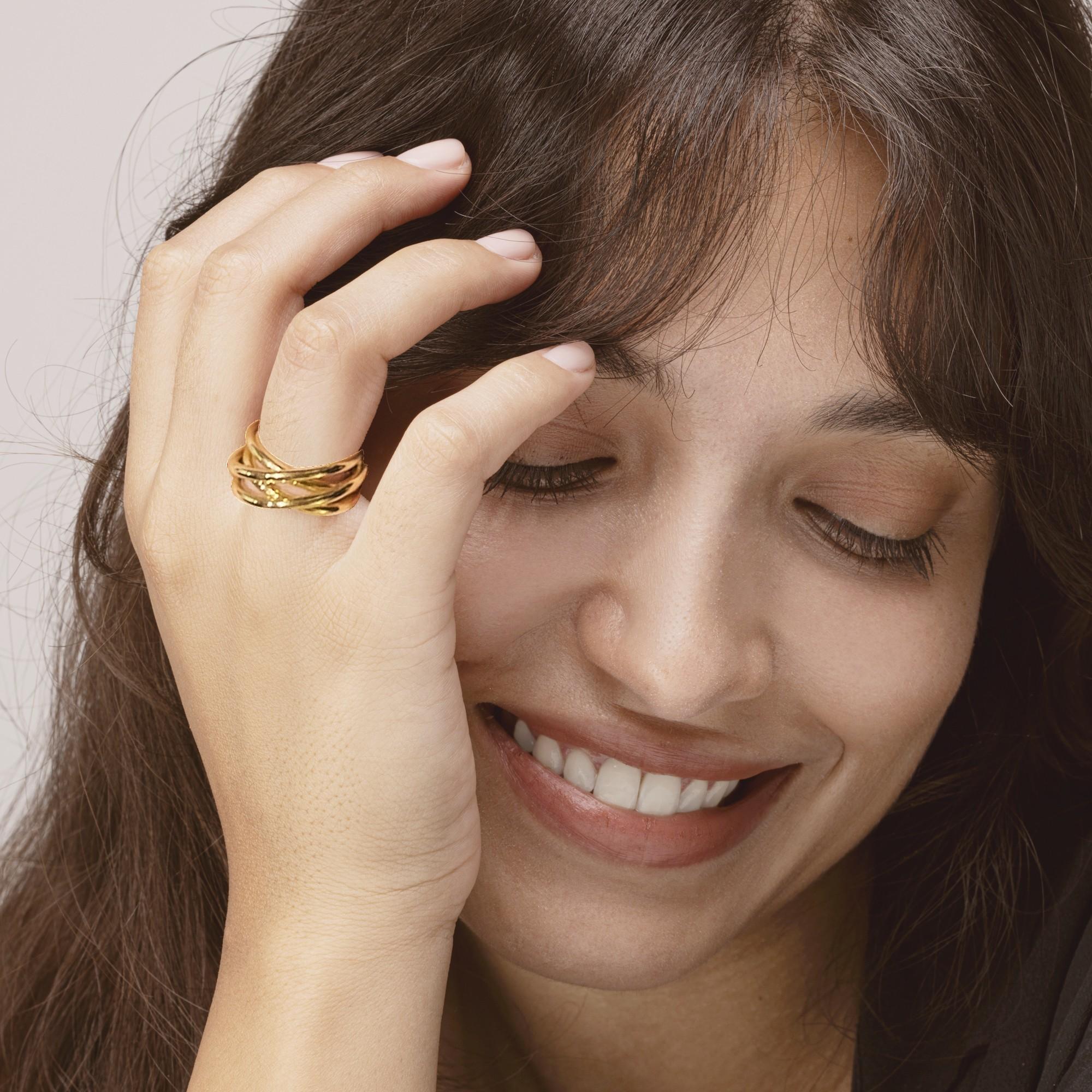 Alex Jona design collection, handcrafted in Italy, 18 karat yellow gold wrap ring.

Alex Jona jewels stand out for the careful attention given to details during all the manufacturing process. Alex's passion for jewels flows in splendid pieces