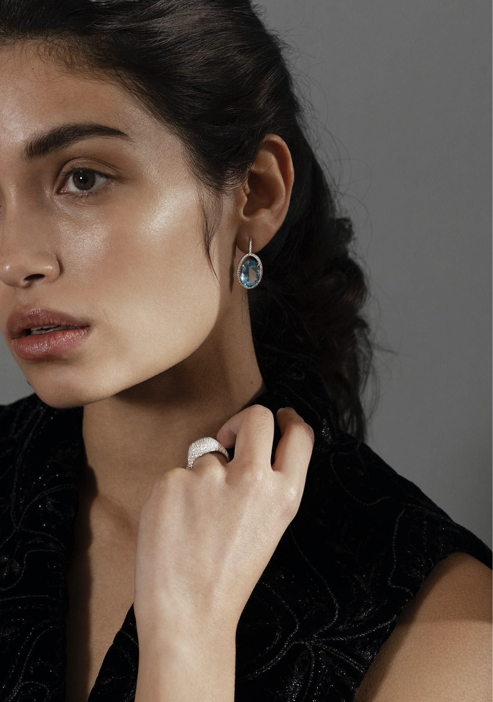 Alex Jona one-of-a-kind collection, hand crafted in Italy, 18 karat white gold pair of earrings, centering two finely cut oval intense blue aquamarines weighing 11.54 carats, surrounded by 0.57 carats of white diamonds, F color, VVS1 clarity.