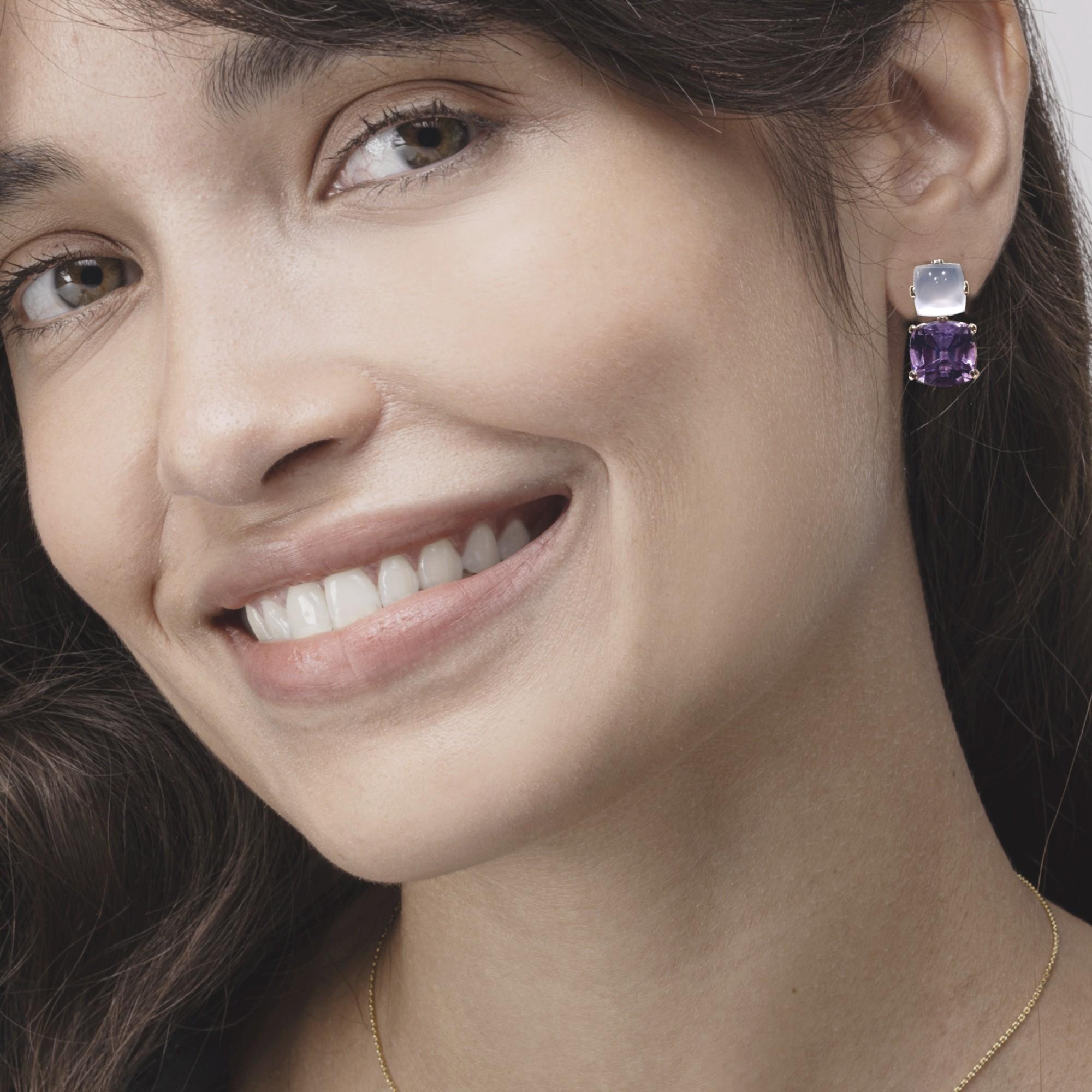 Alex Jona design collection, hand crafted in Italy, earrings featuring 14.50 carats of cut cushion cut pair of amethysts and 10.14 carats pair of chalcedony square cut cabochons.

Alex Jona jewels stand out, not only for their special design and for