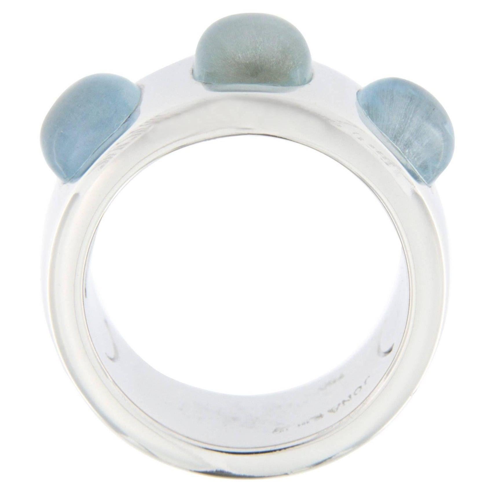 Alex Jona design collection, hand crafted in Italy, 18 karat white gold band ring set with three aquamarine cabochon weighing 4.0 carats in total. US size 6 / EU size 12. Can be made to order in 3o working days.
Dimensions:
H 0.95 in. x W 0.84 in x