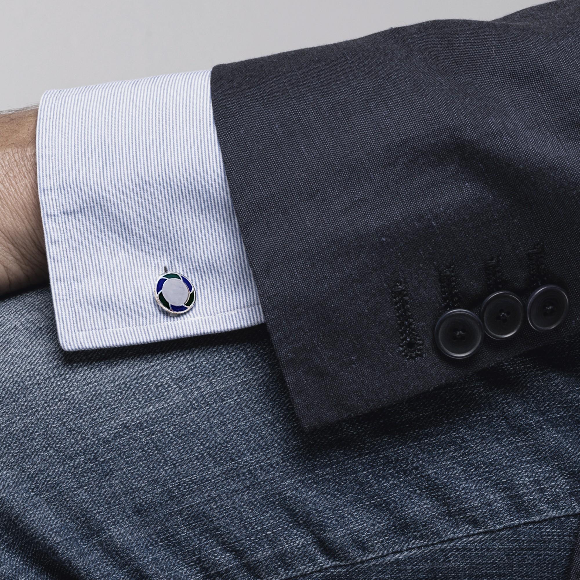 Alex Jona design collection, hand crafted in Italy, sterling silver cufflinks with blue and green enamel.

Alex Jona cufflinks stand out, not only for their special design and for the excellent quality, but also for the careful attention given to