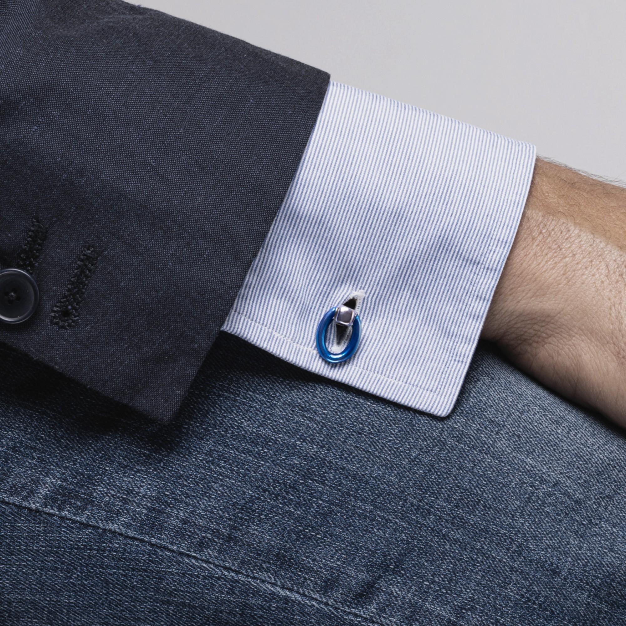 Colección de diseño Alex Jona, hecha a mano en Italia, gemelos plegables de doble anilla de plata de ley con esmalte azul y rojo. 

Los gemelos Alex Jona destacan no sólo por su especial diseño y por su excelente calidad, sino también por la