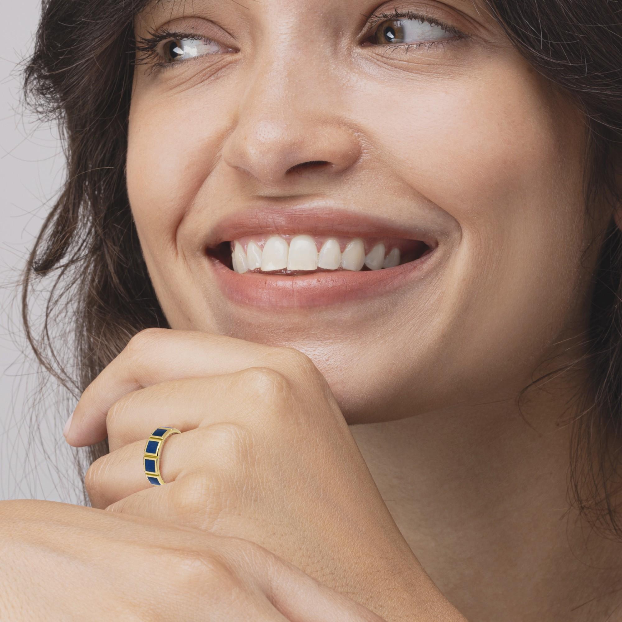 Alex Jona design collection, hand crafted in Italy, 18 Karat yellow gold band ring, adorned with  blue fire enamel segments.
Alex Jona jewels stand out, not only for their special design and for the excellent quality of the gemstones, but also for