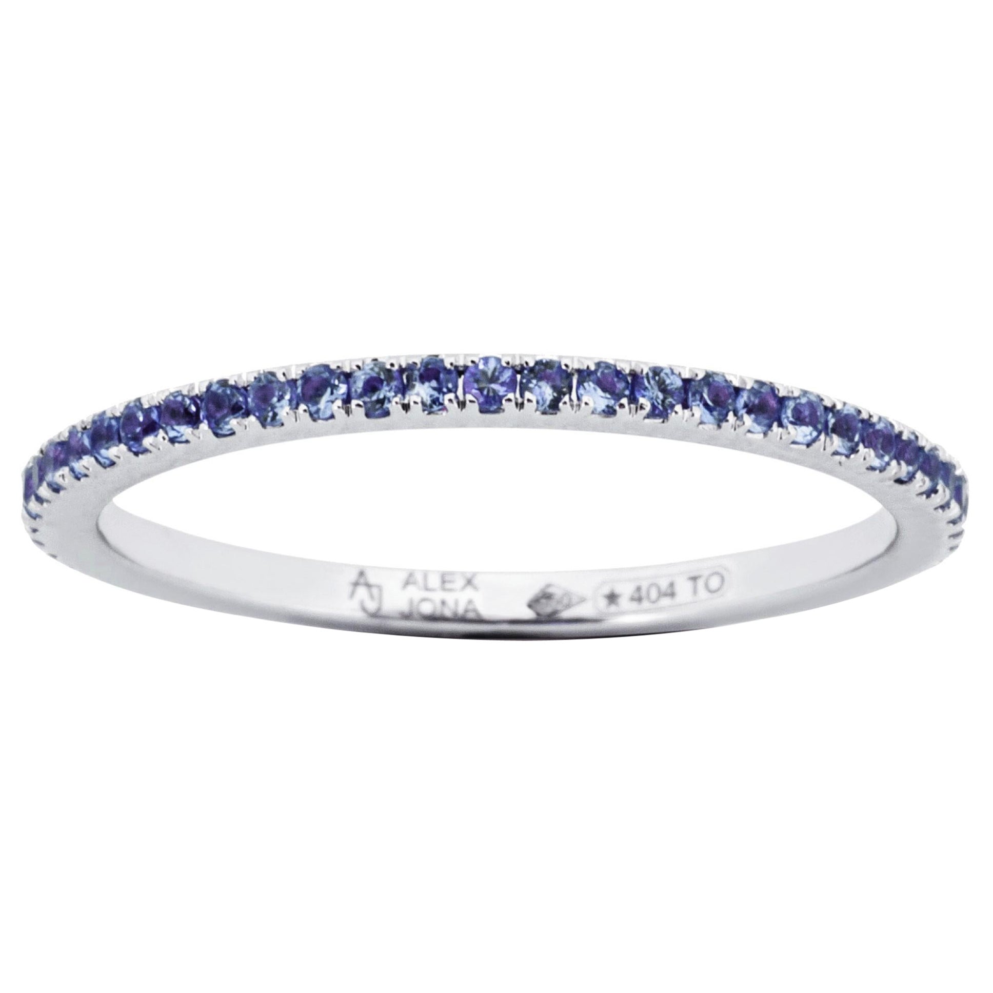 Alex Jona, bague d'éternité en or blanc 18 carats avec saphir bleu en vente
