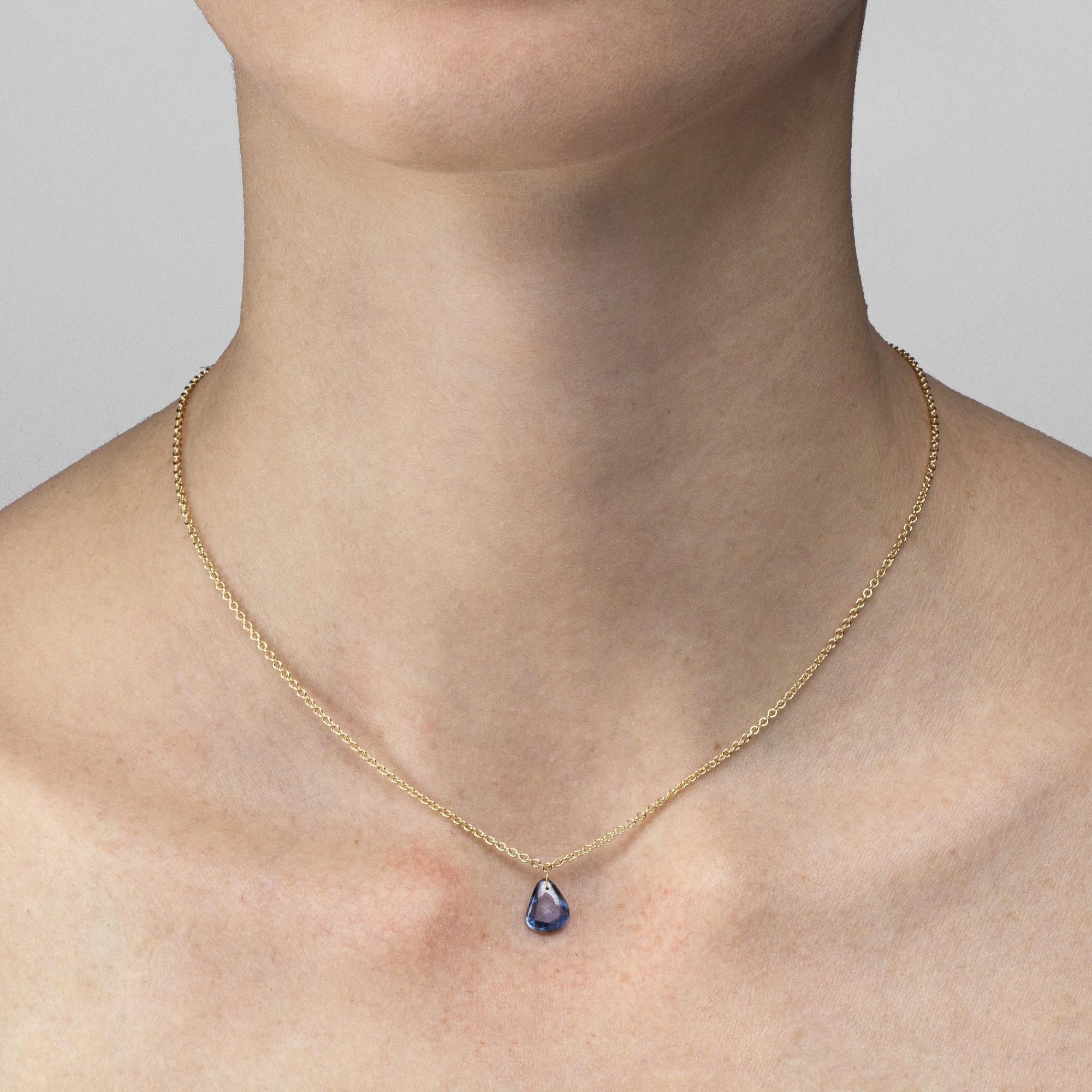 Alex Jona design collection, hand crafted in Italy, 18 Karat yellow gold chain necklace suspending a flat cut blue sapphire weighing 1.39 carats. Dimensions: L x 18.11 in / L x 45cm.

Alex Jona jewels stand out, not only for their special design and