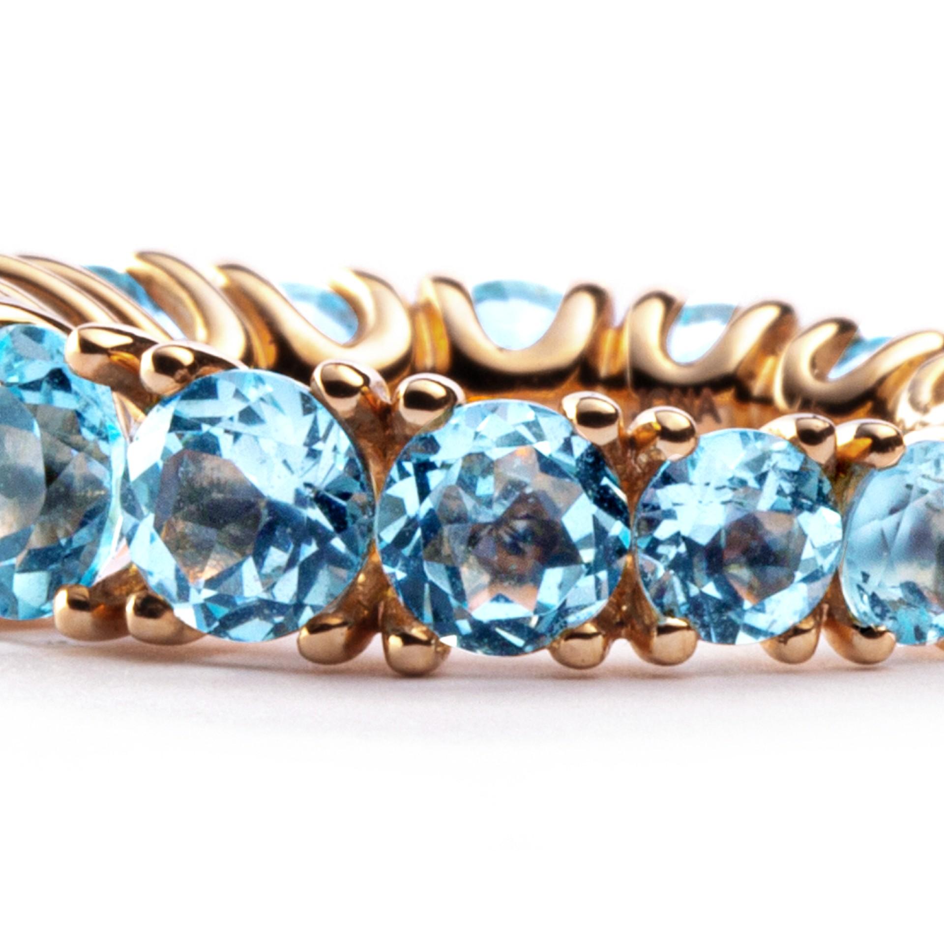 Round Cut Alex Jona Blue Topaz 18 Karat Rose Gold Eternity Ring For Sale