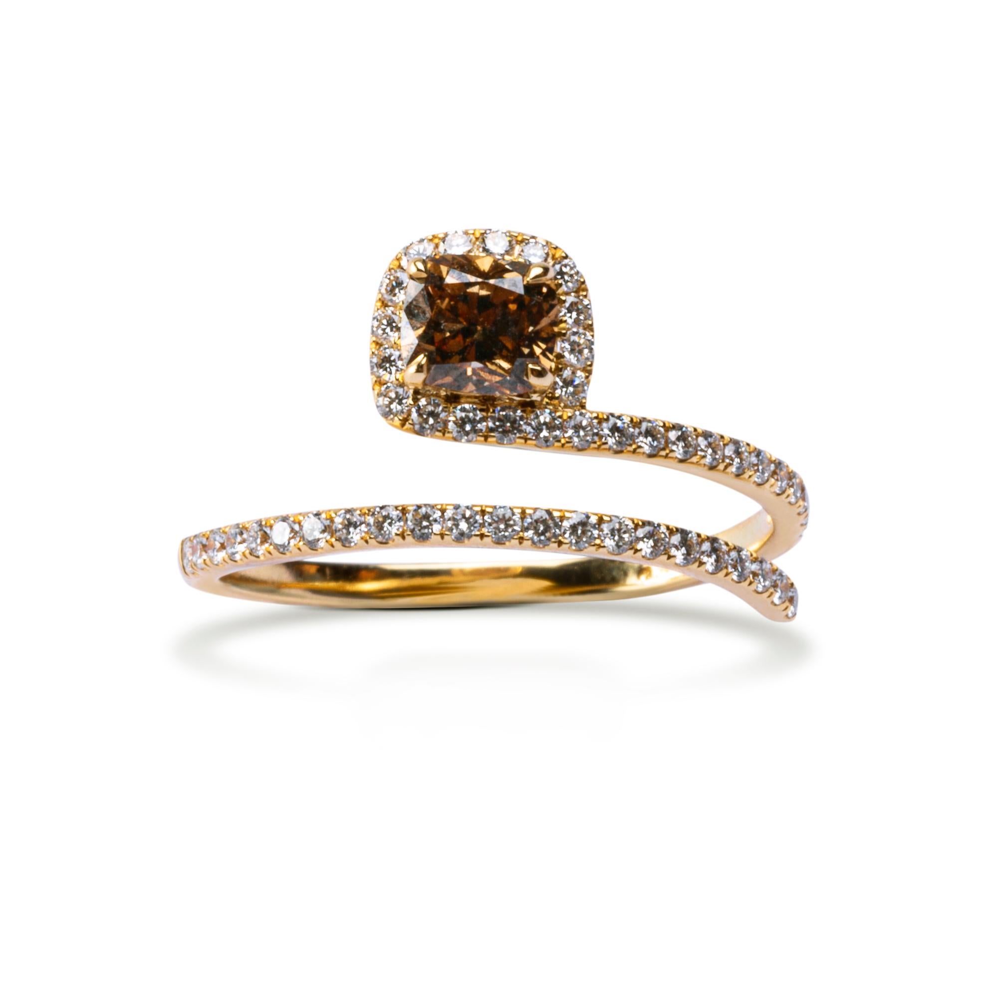 Alex Jona, hand crafted in Italy 18 karat yellow gold coil ring, centering a cushion cut brown diamond weighing 0.47 carats, accented by 50 white diamonds, F color, VVS1 clarity, weighing 0.30 carats in total. 
Size: 6.5 US/12 EU, can be sized to