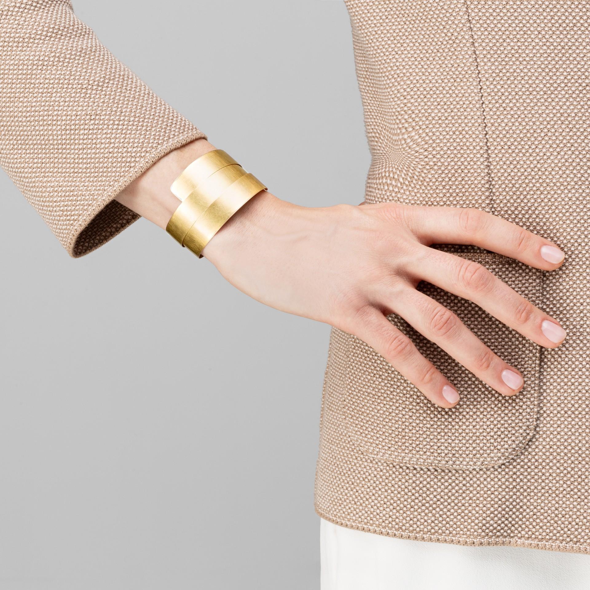 Alex Jona design collection, hand crafted in Italy, 18 karat brushed yellow gold cuff bracelet that wraps around the wrist. Dimensions: Width 15.24 mm, 51.08 mm Diameter.

Alex Jona jewels stand out, not only for their special design and for the