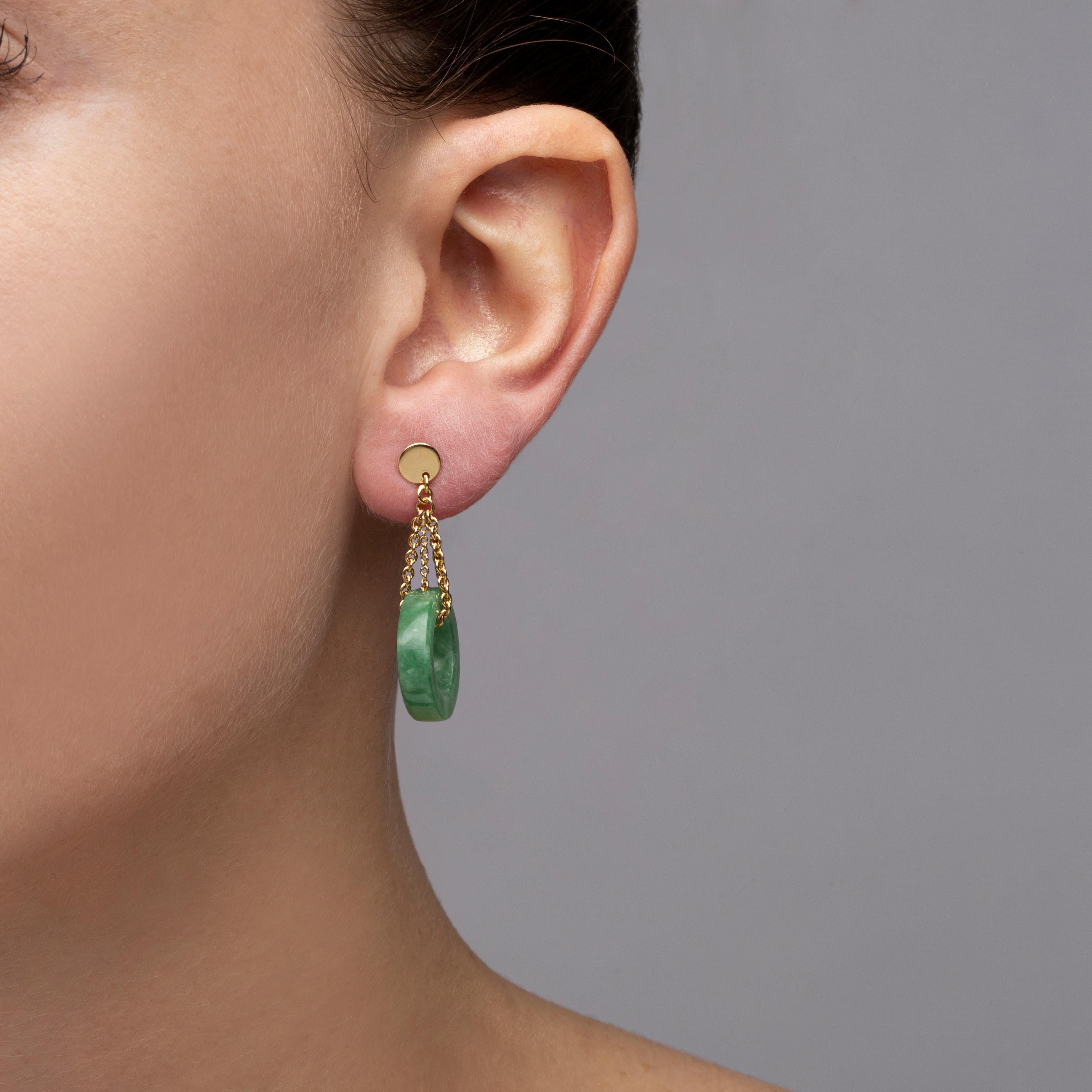 Alex Jona design collection, hand crafted in Italy, 18 karat yellow gold carved Burmese jadeite jade pendant earrings, weighing 10.96 carats.  
Dimensions : H 1.5in/39mm, W 0.74in/18.9mm, D 0.18in/4.77mm.

Alex Jona jewels stand out, not only for