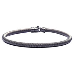Pulsera brazalete de alambre trenzado de plata de ley bruñida Alex Jona