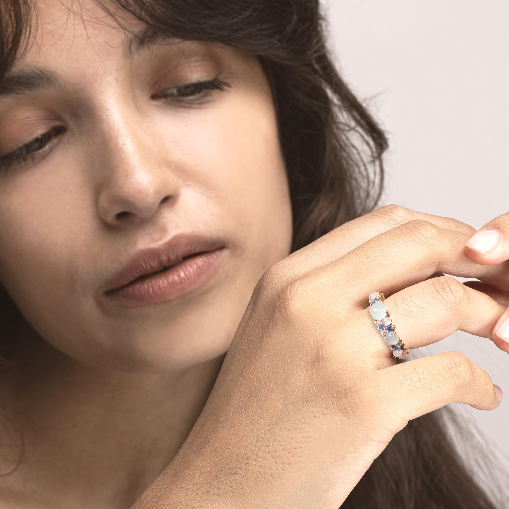 Alex Jona design collection, hand crafted in Italy, 18 karat rose gold ring band, set with cabochon chalcedonies, blue sapphires and 0.12 carats of white diamonds.
Size: US 6/ EU 12. Can be sized to any specification.
Alex Jona gifts stand out, not