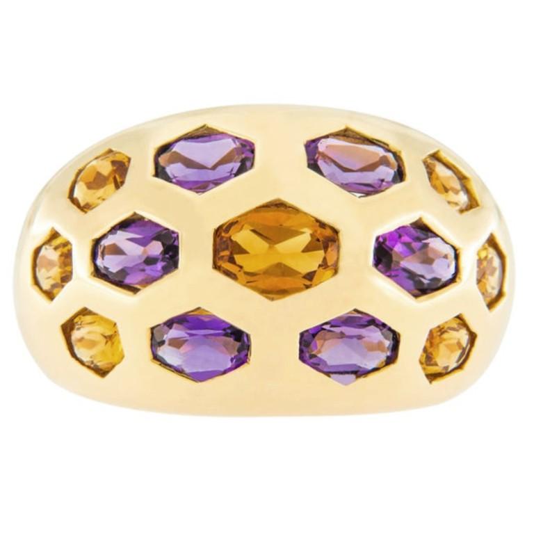 Alex Jona design collection, hand crafted in Italy, 18 Karat yellow gold dome ring, set with hexagonal shaped citrines and amethysts. US size 6.5, can be sized to any specification.  

Alex Jona jewels stand out, not only for their special design