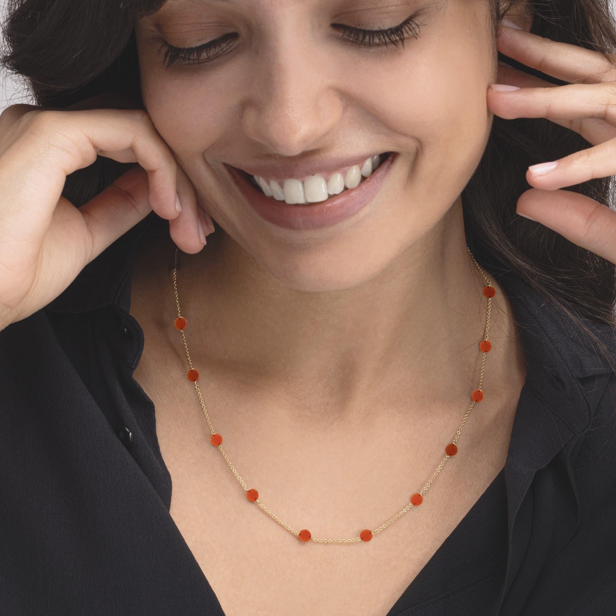 Alex Jona design collection, hand crafted in Italy, 18 karat yellow gold chain necklace alternating 11 mediterranean coral discs. 
Alex Jona jewels stand out, not only for their special design and for the excellent quality of the gemstones, but also