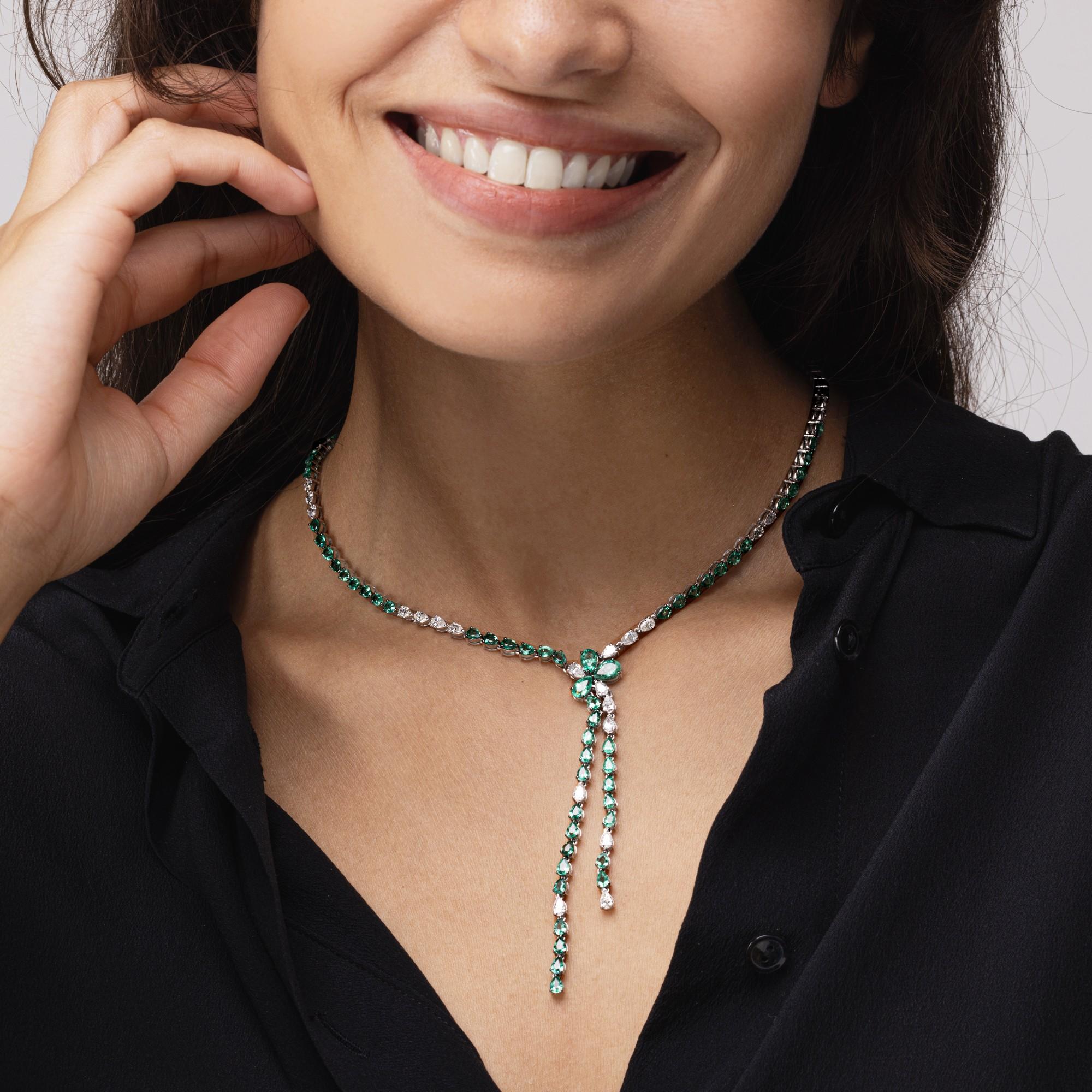 Alex Jona design collection, hand crafted in Italy, stunning 18 karat white gold scarf necklace, set with 4.07 carats of white diamonds and 12.36 carats of emeralds.
Alex Jona jewels stand out, not only for their special design and for the excellent