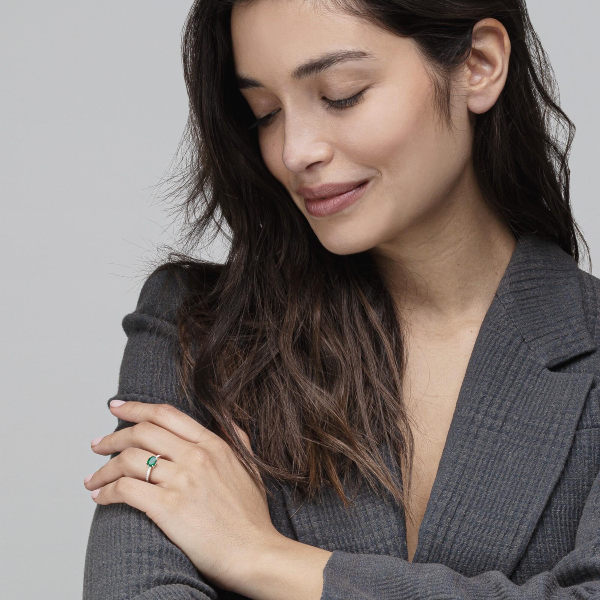 Alex Jona design collection, hand crafted in Italy, 18 karat white gold solitaire ring centering an intense green oval cut emerald weighing 1.15 carats. The shoulders are set with 0.15 carats of white diamonds.
Alex Jona jewels stand out, not only