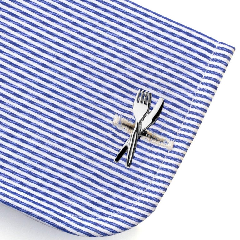 Alex Jona design collection, hand crafted in Italy, rhodium plated sterling silver fork and knife cufflinks. Marked Alex Jona -925. These cufflinks feature a T-Bar fastening, aiding in easy use and confidence that they'll stay secured to your shirt.