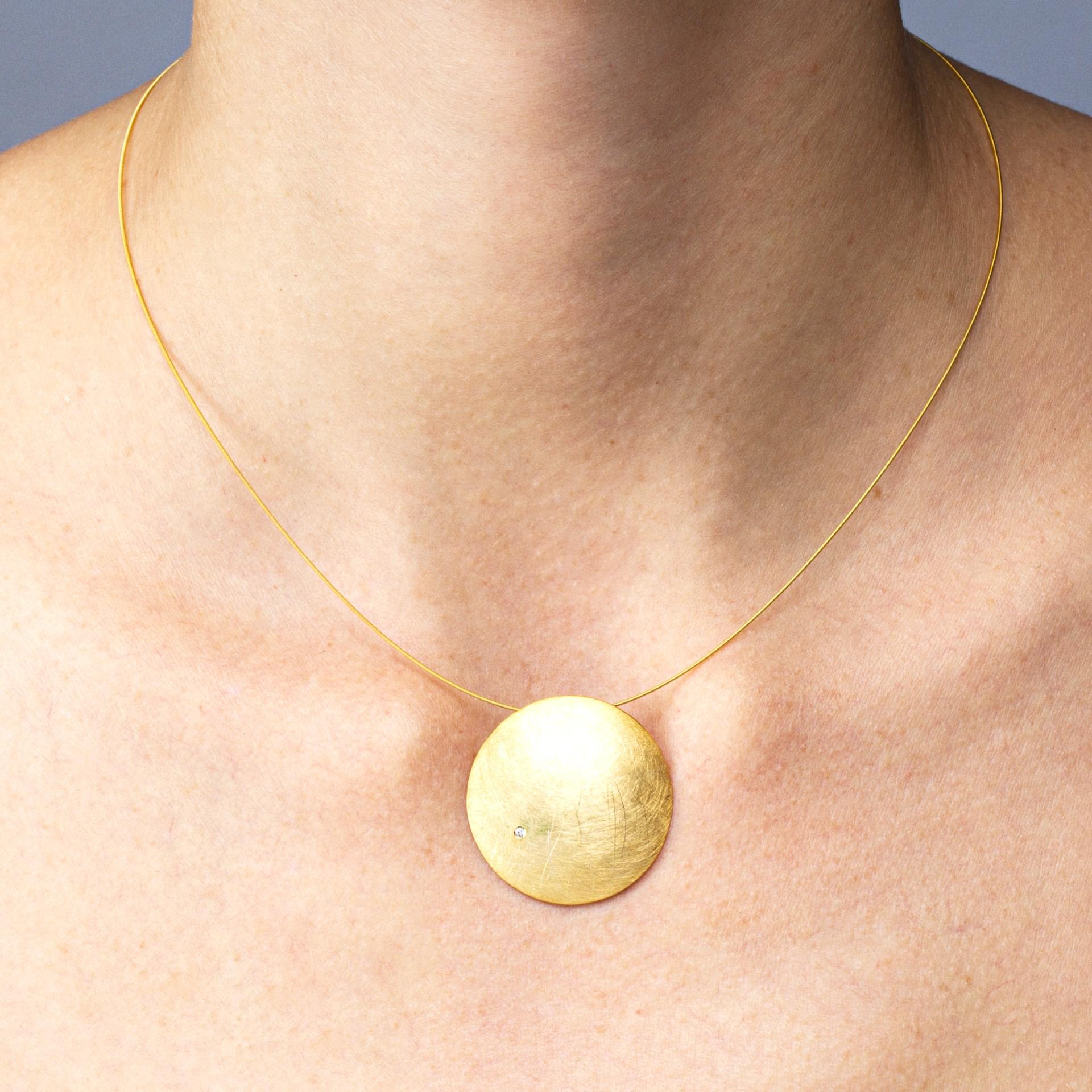Alex Jona design collection, hand crafted in Italy, gold plated sterling silver choker necklace suspending a disk pendant.

Alex Jona jewels stand out, not only for their special design and for the excellent quality of the gemstones, but also for