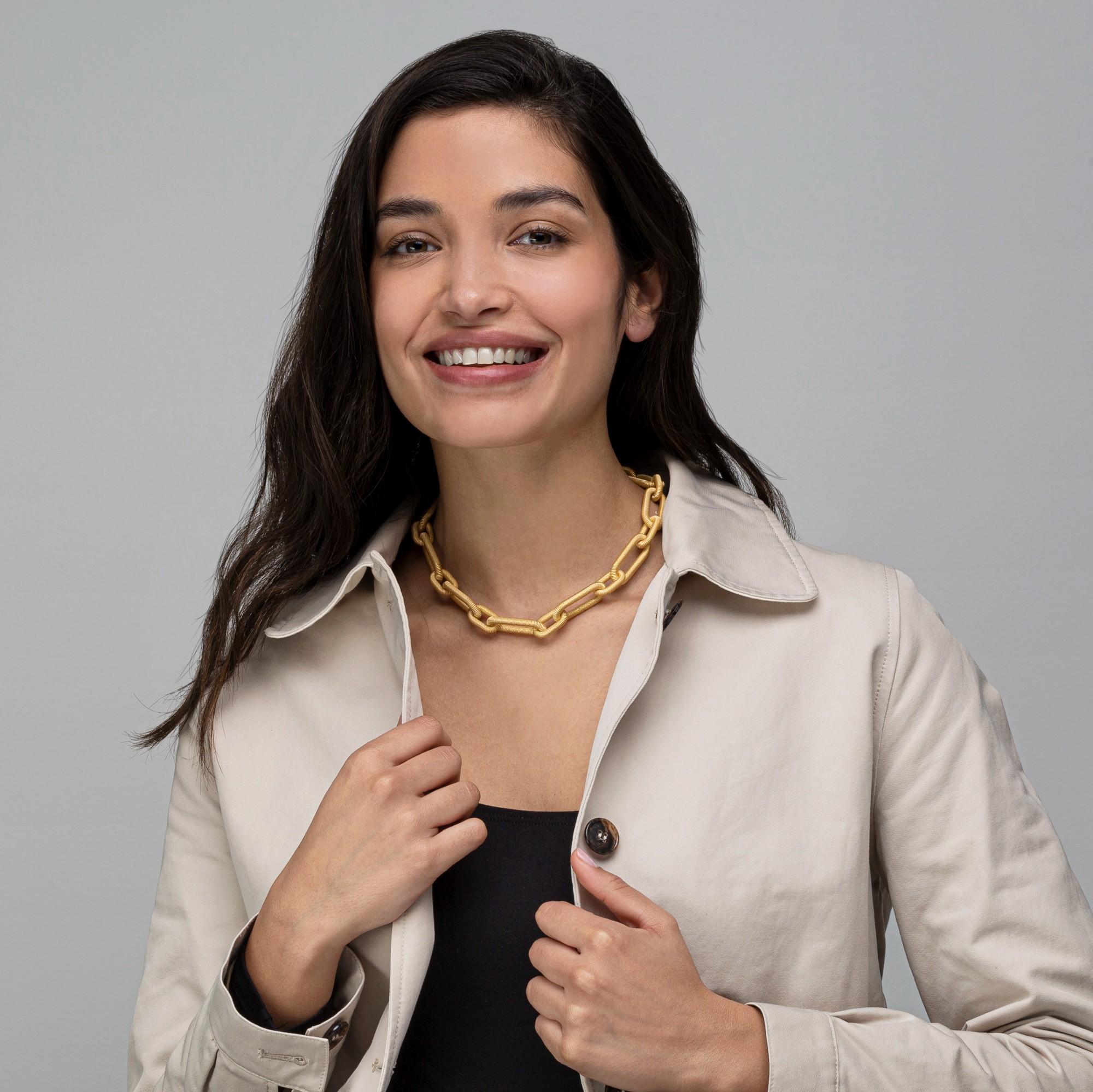 Alex Jona design collection, hand crafted in Italy, gold plated sterling silver twisted wire necklace. 

Alex Jona jewels stand out, not only for their special design and for the excellent quality of the gemstones, but also for the careful attention