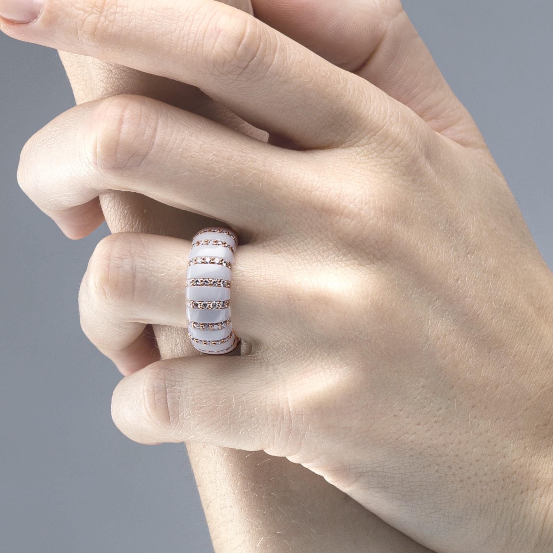 Alex Jona design collection, hand crafted in Italy, flexible ring in shiny white high-tech ceramic and 18 karat rose gold, set with  2.12 carats of white diamonds. Made supple by an inner spring that allows dynamic, simple everyday wearing. US size