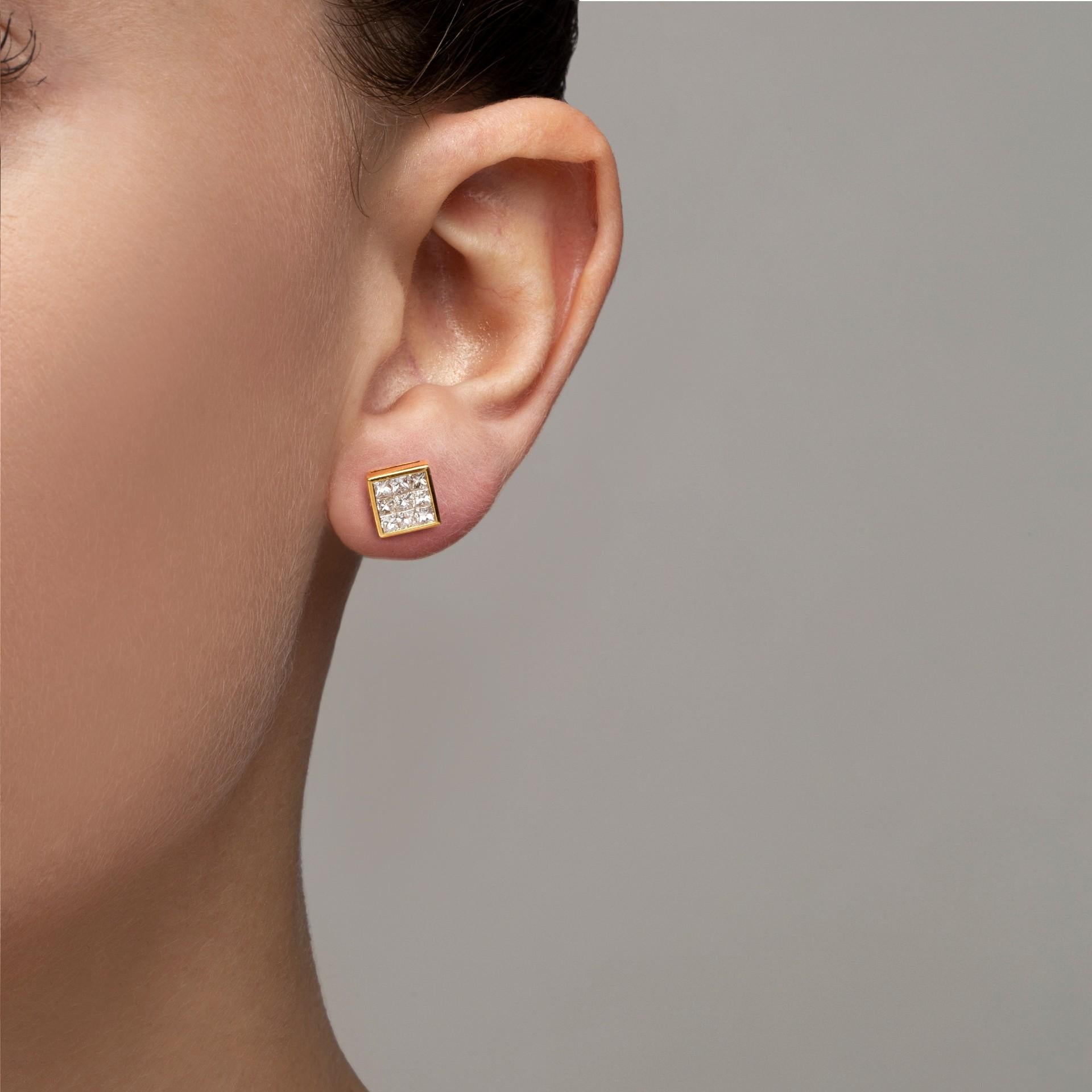 Jona design collection, hand crafted in Italy, 18 karat yellow gold, square stud earrings, featuring 18 princess-cut white diamonds, F color, VVS2 clarity, for a total weight of 1,78 carats set with an invisible setting.
Dimensions : L 0.35 in x W